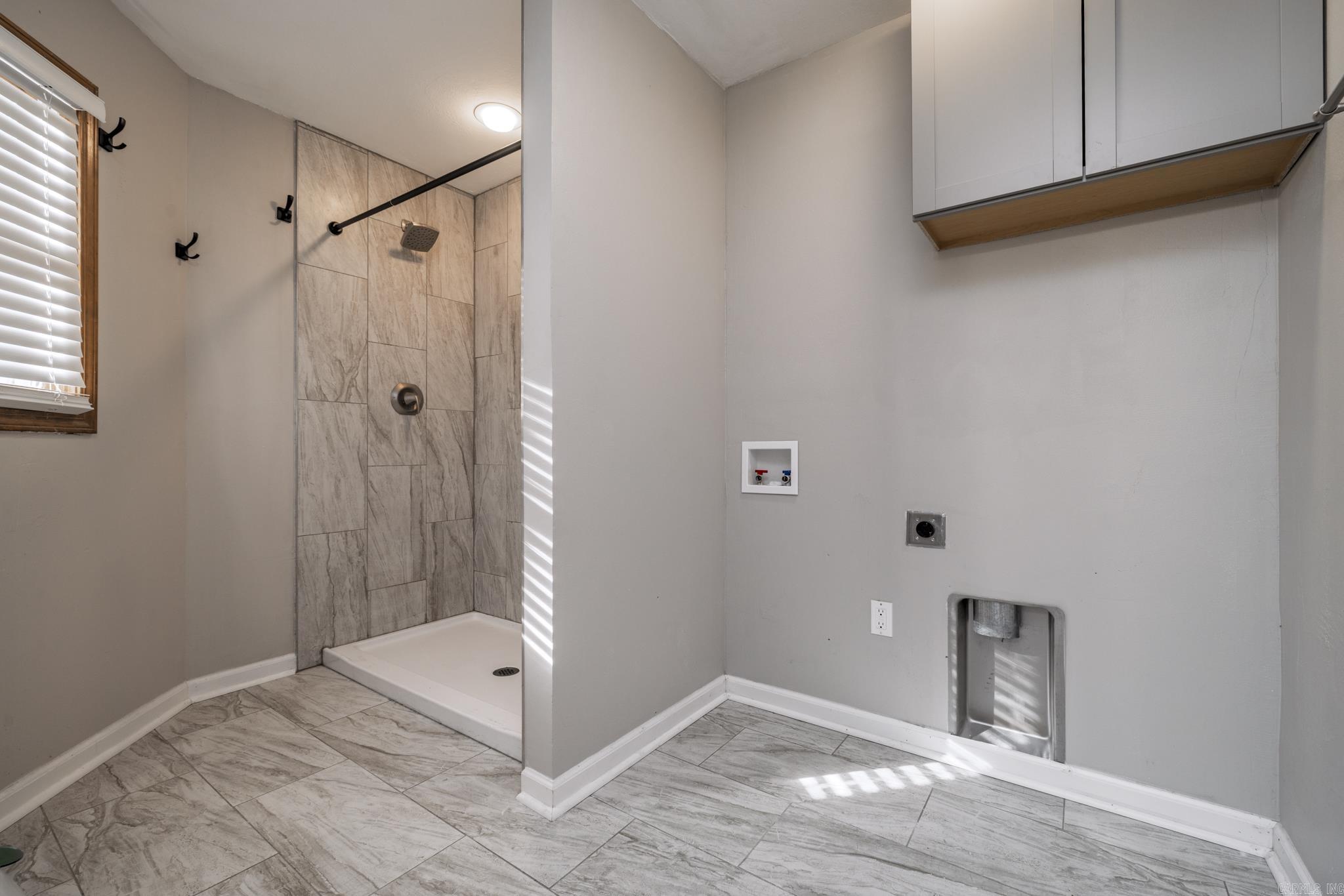Laundry in Primary Bathroom