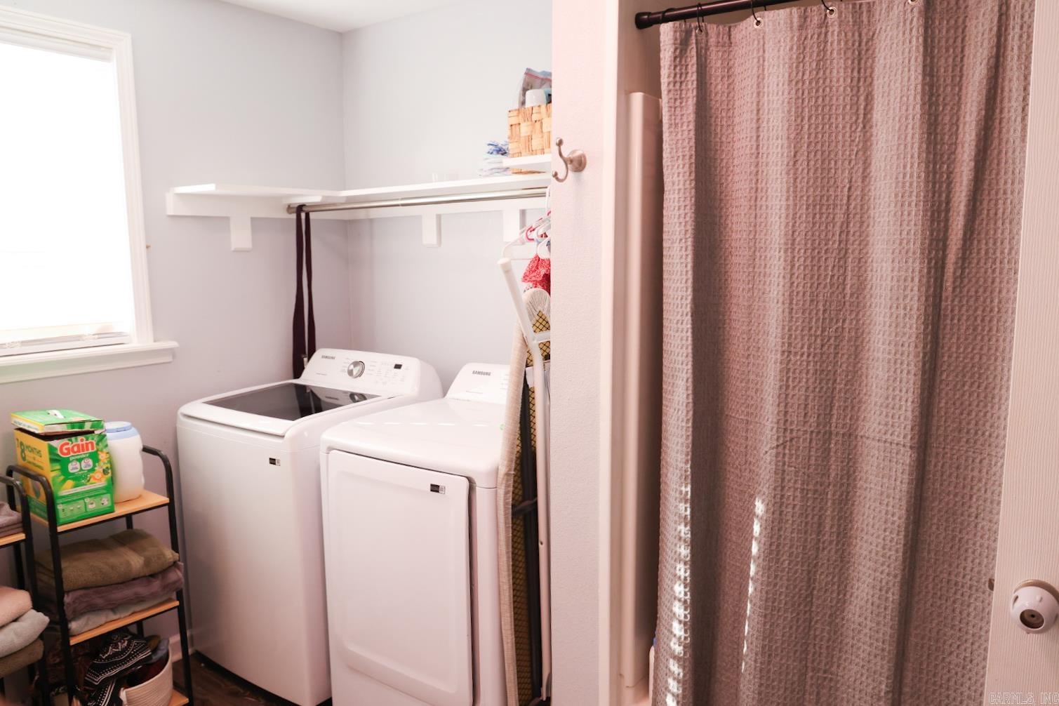 Laundry in bathroom.
