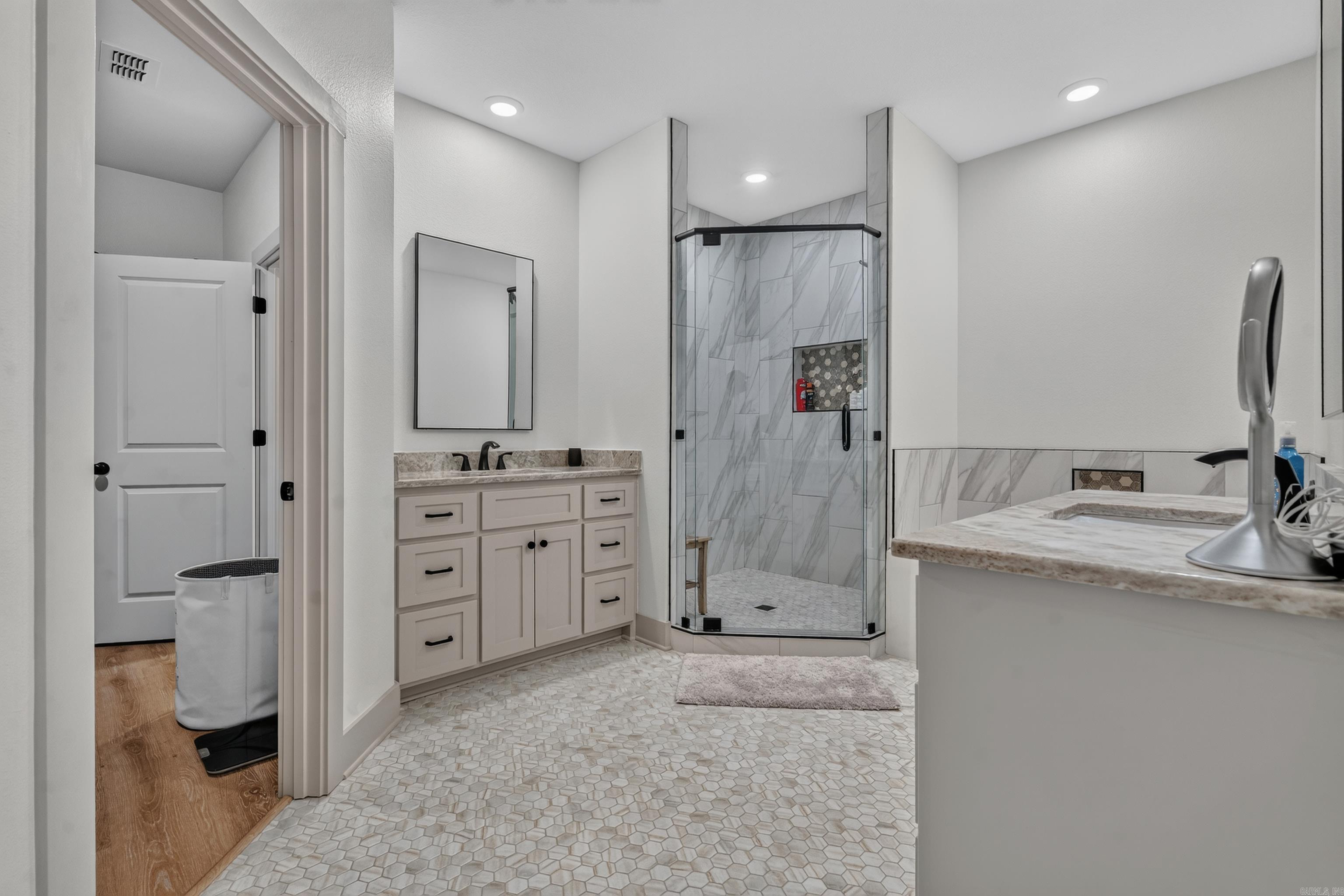 large primary bath with dual vanities