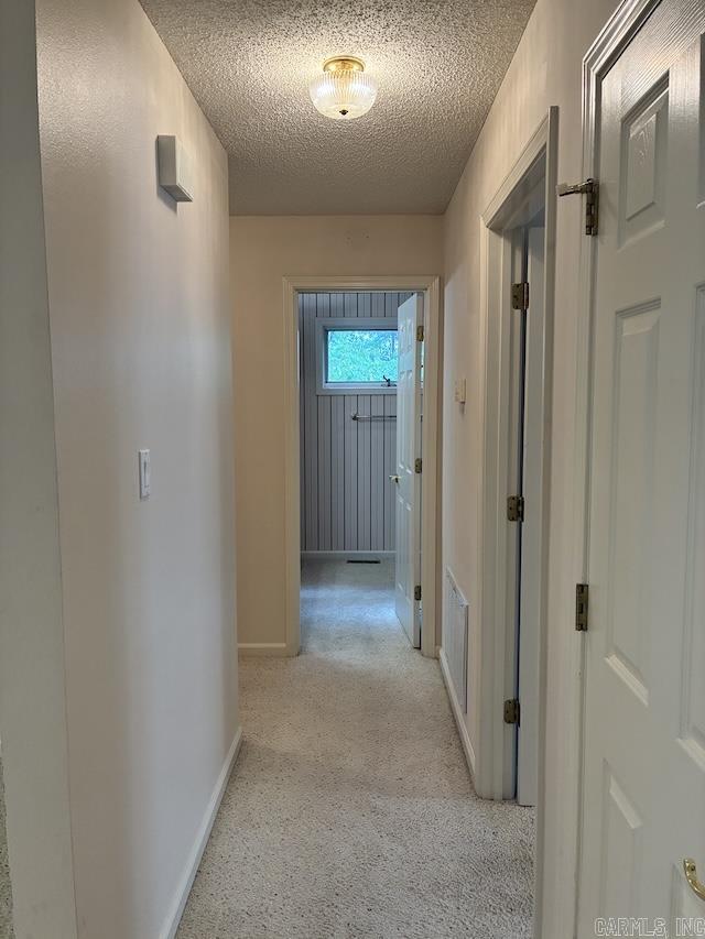 Hallway to guest room 1 and guest bath
