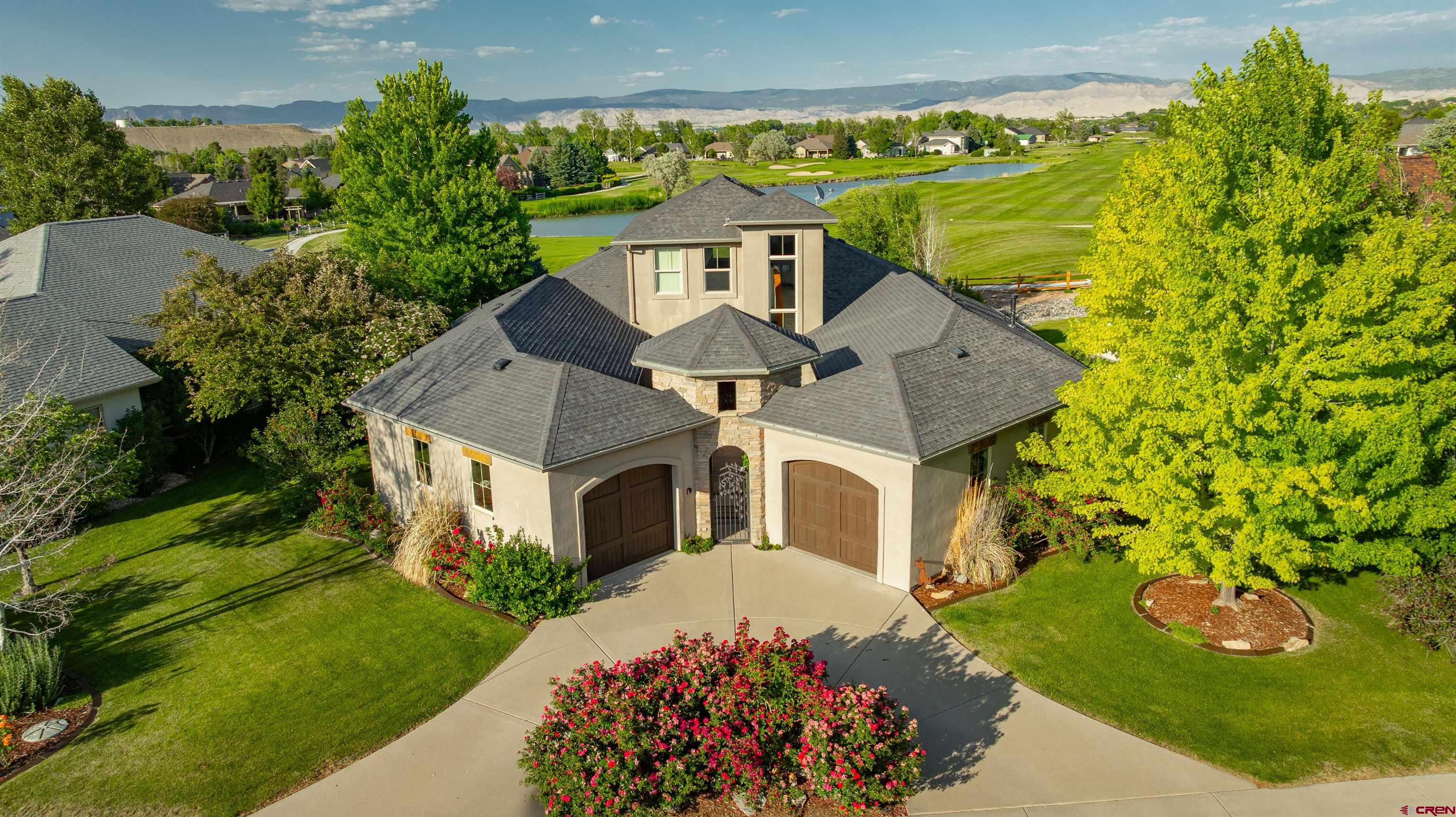 Welcome to 474 Cobble Drive – A Premier Golf Course Retreat in Cobble Creek Experience refined living in this elegant 3,180 sq ft home perfectly positioned along the fairways of Montrose’s sought-after Cobble Creek Golf Community. This thoughtfully designed residence offers 3 spacious bedrooms, 3.5 bathrooms, and the convenience of two separate attached garages, providing space and privacy for residents and guests alike.Step through the gated courtyard entrance into a home that blends comfort and sophistication. Expansive windows frame stunning views of the golf course and surrounding landscape, inviting natural light throughout the open-concept living areas. The layout is ideal for both everyday living and entertaining, with generous indoor and outdoor spaces.The heart of the home features a well-appointed kitchen with ample storage and prep space, seamlessly connected to the living and dining areas. Each bedroom is a private retreat, with the primary suite offering serene views and a luxurious ensuite bath. A dedicated office or flex space adds versatility to meet your lifestyle needs. Enjoy golf course frontage, mature landscaping, and quiet moments on your covered patio as golfers pass by. The included Cobble Creek Social Club membership adds exceptional value, granting access to community events, dining, fitness, and more. Whether you’re searching for a full-time residence or a seasonal escape, 474 Cobble Drive delivers an unmatched blend of quality, location, and community. Schedule your private tour today and discover why Cobble Creek is Montrose living at its finest.