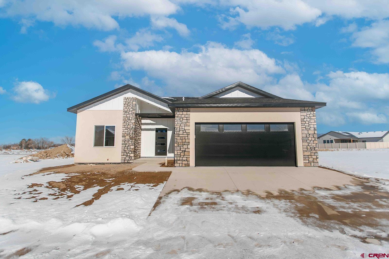 New Construction by EnVision Home Design & Build in the Woods Crossing Subdivision. Builder is offering $10,000 as a SELLER CREDIT OR FOR LANDSCAPE. IN ADDITION, call agent for additional incentives if using builder's preferred lender. Expected Completion: End of January(2026). This quality-built home offers 3 bedrooms + A DEDICATED OFFICE, and 2 bathrooms, plus a spacious 2-car garage—perfect for families, professionals working from home, or those seeking a comfortable retirement home. Interior Features includes: Custom cabinetry throughout Granite or quartz countertops, Stainless steel appliance package, 5 piece primary suite, custom built-in closets. On the exterior: Stucco exterior with stone on the face of home & two back patio's. As the home continues its build progress, we will be updating pictures as we go. Schedule your showing! PROJECTED COMPLETION MIDDLE OF FEBRUARY!