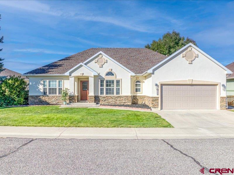 Experience luxury living on the fairway at 3714 Lone Tree Lane! This beautifully updated home sits directly on the golf course, offering unobstructed views of the lush greens and unforgettable Colorado sunsets. With fresh interior and exterior paint and brand-new flooring throughout, this home is truly move-in ready and designed for both comfort and style. The open-concept living space is filled with natural light and perfectly frames the serene golf course setting. Step outside to your private backyard oasis, where a newly color-coded cement patio is ideal for outdoor dining, entertaining, or simply soaking in the panoramic views.  Enjoy the added charm of a side garden and the promise of homegrown goodness from newly planted apple and peach trees. Electrical has already been installed to accommodate a future hot tub! Whether you're an avid golfer or simply appreciate the tranquility of living on the course, this home offers the best of both worlds. Located in one of Montrose’s most desirable neighborhoods, Cobble Creek provides a vibrant, active lifestyle with access to premier amenities, all while being surrounded by natural beauty. Furniture negotiable! Don’t miss this rare opportunity to live on the course in a home that feels brand new — schedule your private tour today!