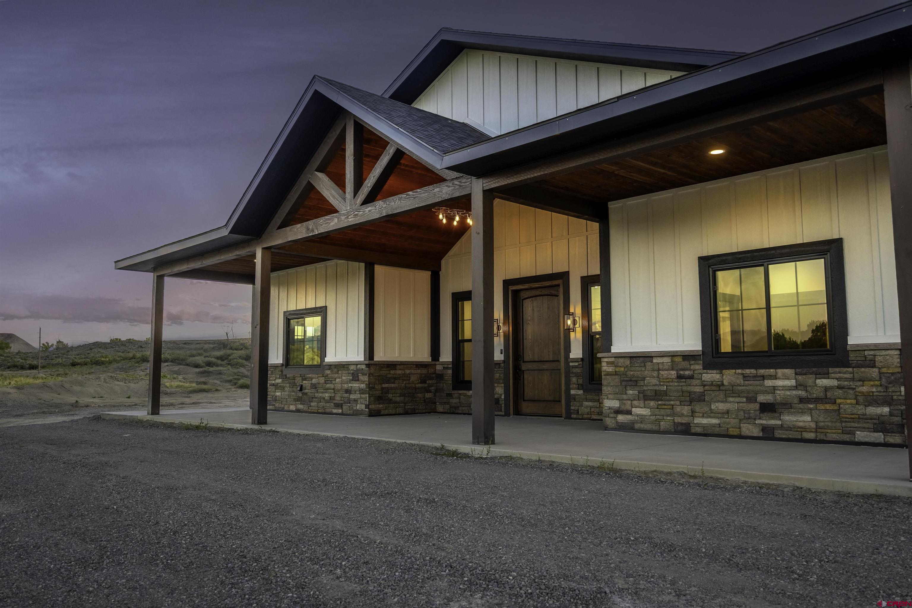 New Built Custom Dream home property for those who want some land for horses or cows, or other critters. This Ranch Style home with Front and Back porches has something for everyone. For the Chefs a drop dead gorgeous kitchen with a large island , walk in pantry, gas range two sinks quartz countertops and backsplash. It is going to make entertaining a joy. For those who like to tinker in the garage, this 3 car garage which is heated and cooled with an office will be all you could dream of. Nestled down in a little valley, the land feels private and picturesque . To Sweeten the deal, Builder is offering a  $20,000.00 incentive to Buyer for a buy down on  interest rate or for Landscaping your choice.