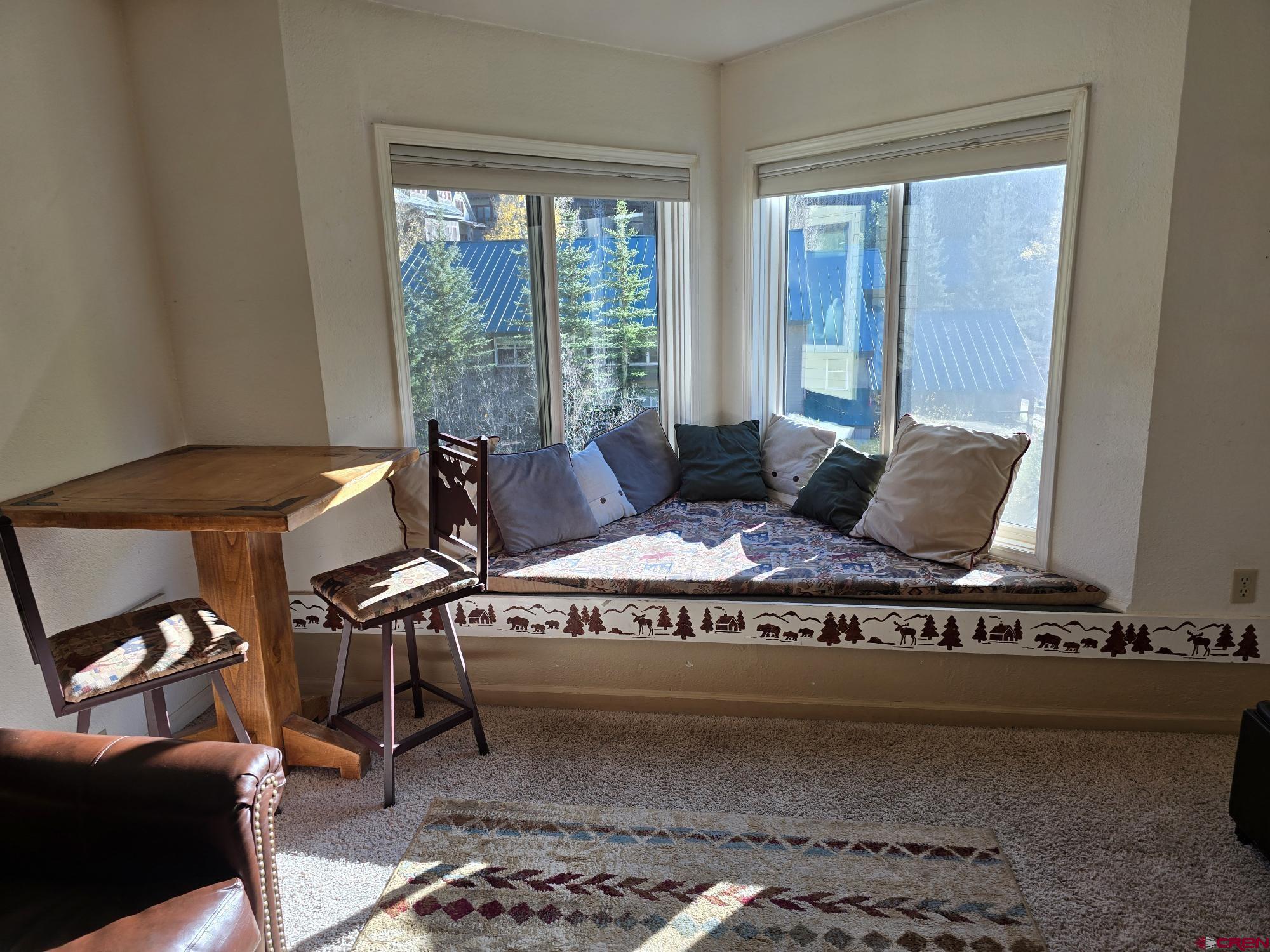 Priced to Renovate!  First time on the market in 20 years. Mostly original condition 1-bedroom with bunk bed alcove, 1-bath, 498 sq. ft., top floor, riverside unit with excellent views of the San Miguel River & mountainside. Walking distance to grocery store, restaurants, gondola, ski lift #7, downtown Telluride, and on the free Galloping Goose bus route. Viking Lodge amenities include outdoor pool, hot tub, laundry facilities, elevator, and off-street parking.