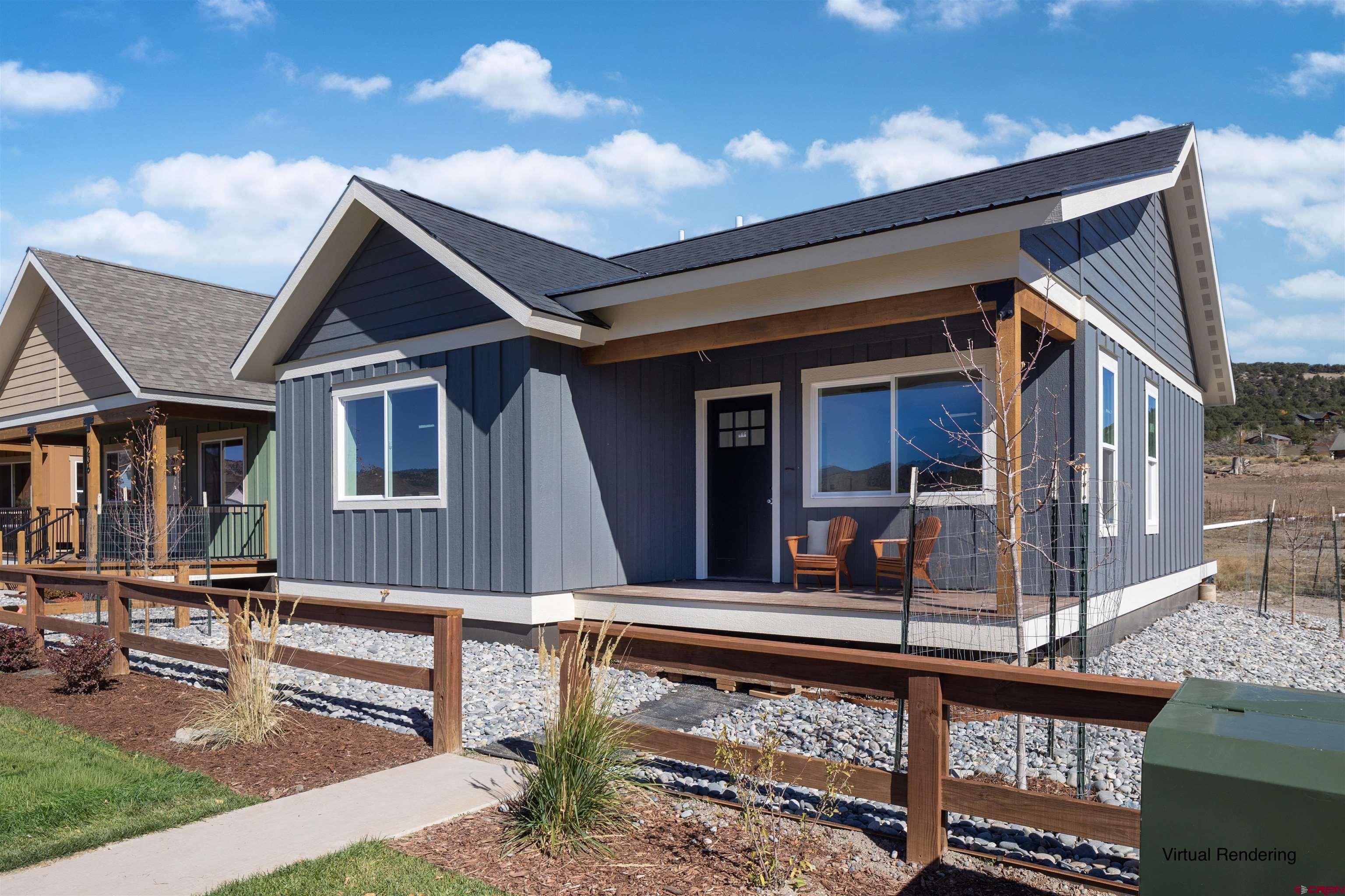 Come see this brand-new 2-bedroom, 2-bath home that is thoughtfully designed for modern mountain living. Enjoy sweeping mountain views from both the front porch and the back deck — perfect for morning coffee or evening sunsets. The owner has upgraded the finishes throughout, adding a custom touch to the final design.   The Vista Park Commons community is built around connection and comfort, featuring a clubhouse for gatherings, an oversized hot-tub and deck area for relaxing, two parking spaces, and a large storage unit. Created to foster a friendly, interactive neighborhood, it's also incredibly dog-friendly — the ideal spot for both people and pups to call home!  Conveniently located with easy access to downtown Ridgway, you'll enjoy local restaurants, shops, hot springs, and all the charm this vibrant mountain town has to offer.