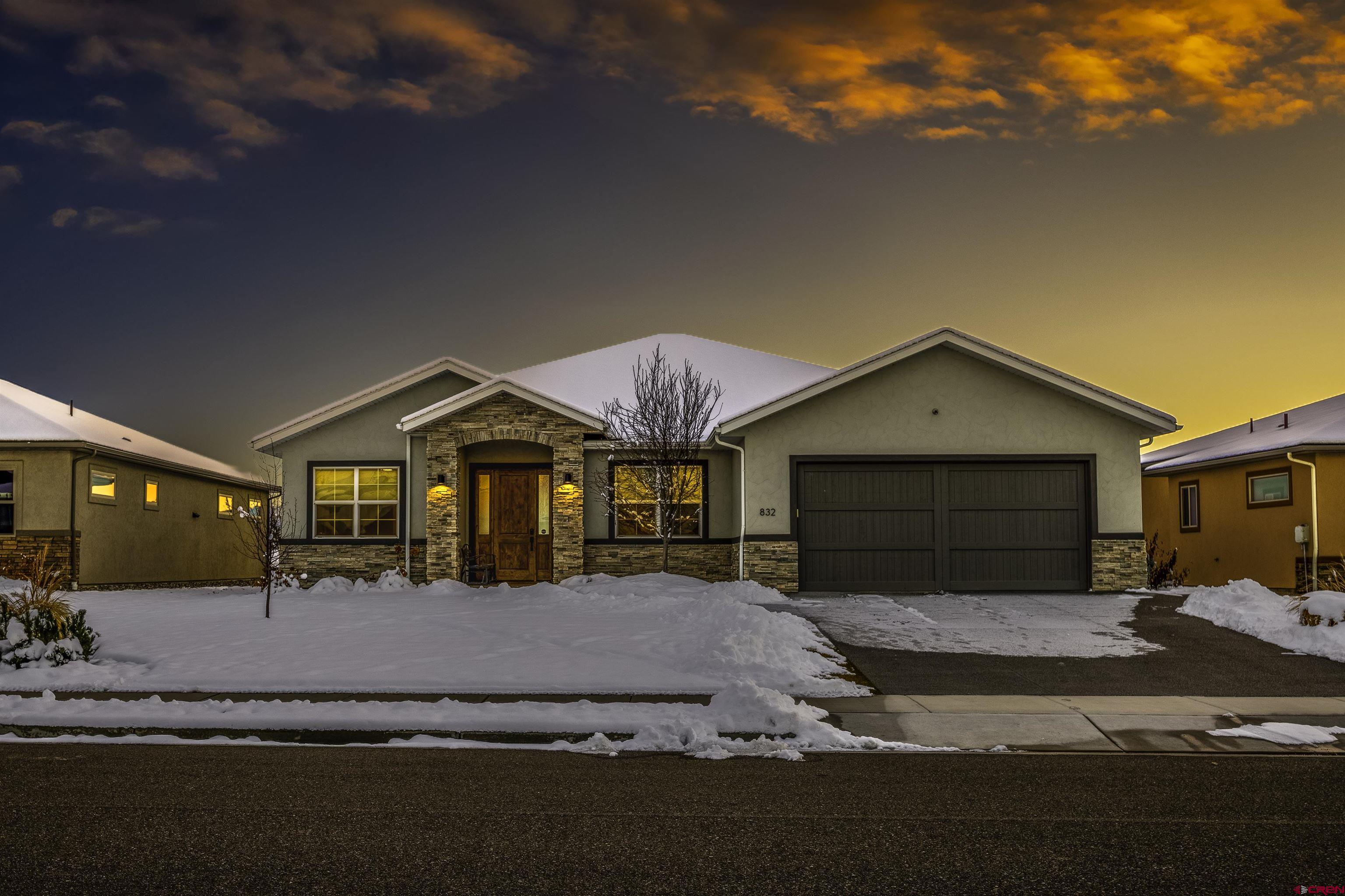 Discover the kind of Colorado lifestyle buyers are searching everywhere for at 832 San Sophia Drive—a home that checks all the boxes: mountain views, privacy, low maintenance, single-level living, and a premier golf community. Homes on this coveted street rarely come available, and once you see the view for yourself, you’ll understand why.  Perched along an open field with jaw-dropping, unobstructed southern mountain views, this home was designed to capture the scenery from nearly every angle. The oversized patio and hot tub create a peaceful outdoor retreat—perfect for morning coffee, sunset watching, or hosting friends while the San Juans glow in the background. It’s quiet. It’s private. And the views are the kind that make you stop talking mid-sentence.  This is a true zero-step, lock-and-leave home where your lawn care and snow removal are handled for you through the Sub-HOA. Whether you live here full-time or part-time, you can simply lock the door and go—your property is taken care of.  Inside, the layout is ideal. The split floor plan gives the primary suite its own wing, complete with direct patio access so you can wake up to the mountains every day. The ensuite features a double vanity, tiled walk-in shower, private toilet room, and spacious walk-in closet.  Guests will enjoy their own comfortable bedroom and full bath on the opposite side of the home. A third room—with a full closet and natural light—offers endless flexibility: guest room, office, hobby space, or quiet den.  At the center of the home, the chef’s kitchen shines with level 3 leathered granite countertops, a lighted pantry, generous workspace, and a layout that makes cooking and entertaining effortless. The living area is anchored by three oversized picture windows that perfectly frame the panoramic mountain backdrop and bring the Colorado sunshine flooding in.  Located within the desirable Cobble Creek Golf Community, you’re minutes from golf courses, walking paths, and the clubhouse—yet still just a short, easy drive to Montrose’s shopping, dining, and amenities. As an added bonus the 2 car attached garage has an extra deep bay to accommodate 2 cars plus a golf cart!  This home offers an unmatched blend of comfort, convenience, and natural beauty. If you’ve been waiting for a property that truly feels like Colorado living at its finest, this is it. Come experience the views in person—they’re even more breathtaking than the photos.