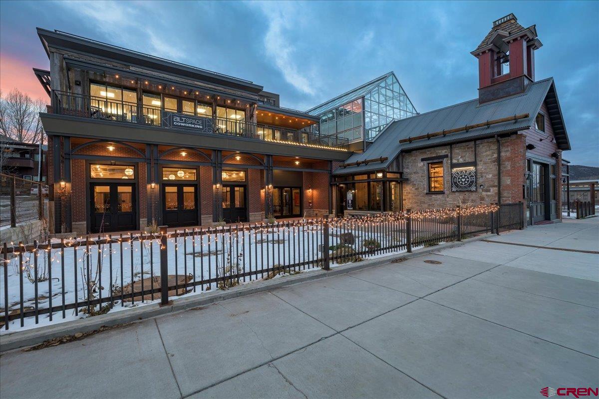 Unfinished 3-Bed | 2-Bath Luxury Penthouse with Rooftop Balcony & Panoramic Mountain Views  Step into one of Ridgway’s most remarkable residential offerings — Condo E, the Penthouse at the Old Firehouse. This top-floor, 3-bedroom, 2-bath luxury shell combines historic character, modern architecture, and a rare opportunity to complete the interior to your exact taste. High ceilings, abundant natural light, and an intuitive floorplan set the stage for a truly elevated mountain-town residence.  Indoor/outdoor living with show-stopping mountain views. Along the east side, full-height glass walls open directly onto a private rooftop balcony overlooking Ridgway’s beloved Town Park. This exceptional outdoor living space features a two-sided indoor/outdoor fireplace, creating a seamless transition between the great room and the terrace. From sunrise glow to alpenglow sunsets, you’ll enjoy unobstructed panoramic views of the Cimarron and San Juan Mountains — a breathtaking backdrop for quiet mornings, dinner parties, or relaxing under the Colorado sky.  A luxury canvas ready for your final vision. Construction is already well underway, and major systems are in place. What remains — trim, flooring, kitchen installation, fixtures, and final finishes — allows you to customize every detail. Whether your style leans toward modern mountain, rustic elegance, or minimalist luxury, this Penthouse gives you the freedom to design without compromise.  Prime in-town living in an iconic Ridgway landmark. Set within the carefully restored Old Firehouse, this residence is just steps from restaurants, shops, parks, and the creative district. With Ridgway’s thriving lifestyle scene and easy access to Ouray, Telluride, and the San Juan region, this address offers both convenience and adventure.  Key Features: • Unfinished luxury Penthouse with premium customization potential • 3 bedrooms | 2 bathrooms | open, light-filled layout • Glass walls opening to private rooftop balcony • Two-sided indoor/outdoor fireplace • Panoramic Cimarron + San Juan Mountain views • Overlooks Ridgway Town Park • Historic building with modern infrastructure • A rare opportunity in a limited-inventory market  For buyers seeking a standout residence with unmatched views and the freedom to finish it their way, the Penthouse at the Old Firehouse is truly one of a kind.