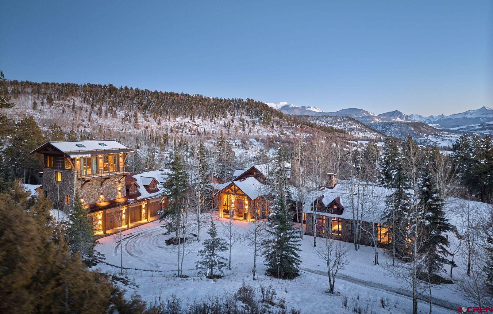 Set within the gated enclave of Brown Ranch on Iron Springs Mesa, ''Stoneflower'' is a masterfully crafted 75-acre mountain ranch & estate offering rare privacy, sweeping 360-degree views & effortless year-round access just 30 minutes from Telluride's downtown. Enhanced by a dramatic tower addition in 2019, the residence blends timeless stone architecture with refined modern comforts. The home offers five en-suite bedrooms, seven full & two half baths, including a grand primary suite w/ dual baths, steam shower, fireplaces & private terrace. Designed for entertaining & retreat, the property includes a dramatic art gallery hallway, offices for remote work & stunning stone media room. Expansive patios, terraces & hot tub overlook a stocked 1-acre trout pond. 2 wells, Starlink, solar back-up
