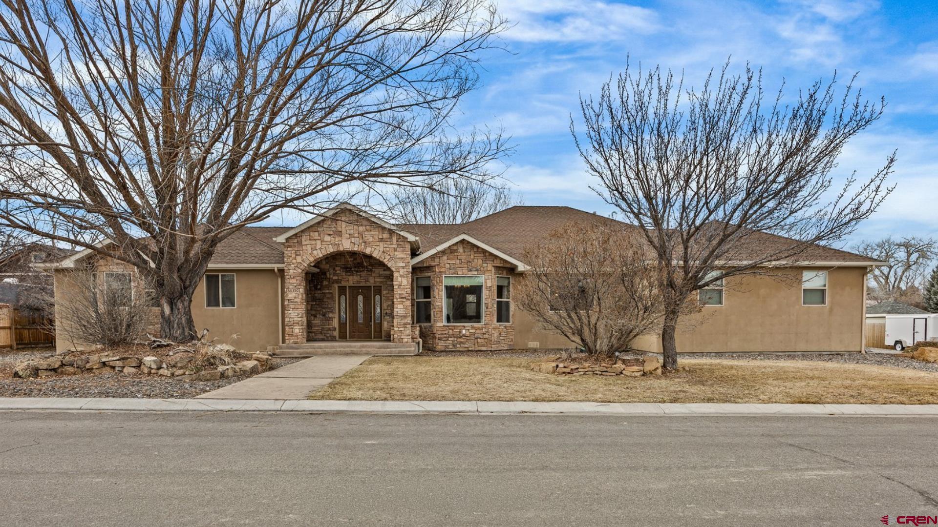 Pristine and Elusive Sprawling Ranch Home on a Huge Lot with RV Parking, 2 En-Suites, High Quality and Custom Features Throughout! Secluded and quiet while boasting incredible access to all of the best amenities Montrose has to offer, this home checks all the boxes and then some. Step inside to a massive, open concept with gorgeous hardwood floors, a vaulted ceiling, a pass-through fireplace, built-ins, and plenty of room for all the hosting and entertaining you can imagine. The kitchen provides excellent counter space and an ergonomic layout, complete with a huge island, quality wood cabinets, and a large window over the sink bringing in abundant natural light. Conveniently located right off the kitchen is the laundry/utility room of your dreams, with an additional sink, half bath, and excessive storage and space to keep all the mess out of sight. The benefits continue with an oversized primary suite, with private access to the incredible backyard oasis, and even has room for a reading nook or yoga mat. It includes a huge walk-in closet and additional smaller closet, a beautiful tiled walk-in shower and great natural light. Have multi-generational living needs, or just love to host and give your guests the time of their life? Enjoy a 2nd en-suite with its own walk-in closet and quality finishes. A 4th bedroom with the pass-through fireplace could be an elevated spot for your home office or gym. An oversized, 3 car garage would accommodate larger vehicles, while still providing room for your projects and tinkering. The backyard takes you to a new level of peace and tranquility with an extended pergola featuring mesmerizing views, and is the ideal spot to unwind and decompress from life's stressors with your favorite beverage in hand. With a large detached storage shed, an ideal RV parking setup, a huge lot with all the potential in the world, is this even a decision? Secure Your Spacious, Custom Ranch Home with All the Personality and Function in the World, Tucked in a Prestigious Neighborhood in South Montrose; Take a Tour Today!