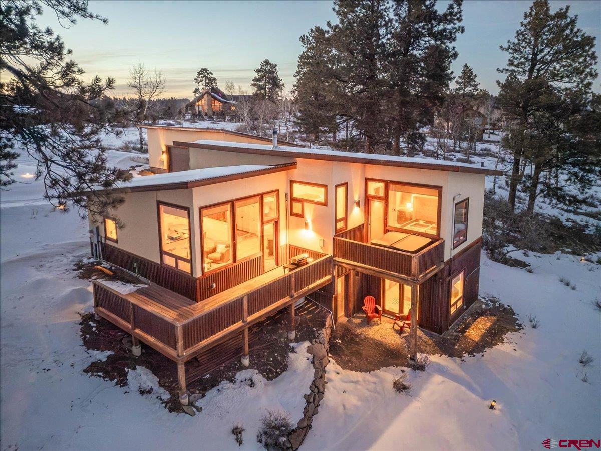 Step into modern serenity in this 3-bedroom, 2.5-bath mountain home, perfectly positioned on Miller Mesa above Ridgway, Colorado. Thoughtfully designed to showcase the beautiful San Juan Mountains from every angle, this residence offers a rare, front-row seat to Colorado’s most cinematic landscapes.  Imagine waking up to bold alpine vistas and sipping coffee in an expansive, open-concept living and kitchen area where massive windows act as living frames for the peaks. Whether hosting an intimate dinner or watching the light fade over the range, the space feels both intentional and effortless. From the gentle warmth of in-floor radiant heating, to the crisp luxury of air conditioning throughout the home, and with a 3-stage whole home water filtration system, this is a perfect sanctuary for every season.  The home is engineered for both adventure and functionality. The oversized, heated garage is equipped with a full-length structural I-beam for your most ambitious projects. Imagine the potential for your professional workshop or high-performance gym. After a day spent hiking or skiing the nearby Miller Mesa Trail or Top of the Pines park, transition to your private wellness oasis. Unwind in your hot tub under the stars or recover and rejuvenate in the sauna and cold plunge creating your own mountain spa retreat.  This is more than a residence; it is a lifestyle to be embraced. Welcome to a property where modern comfort and rugged beauty exist in total harmony. Can you see yourself here?