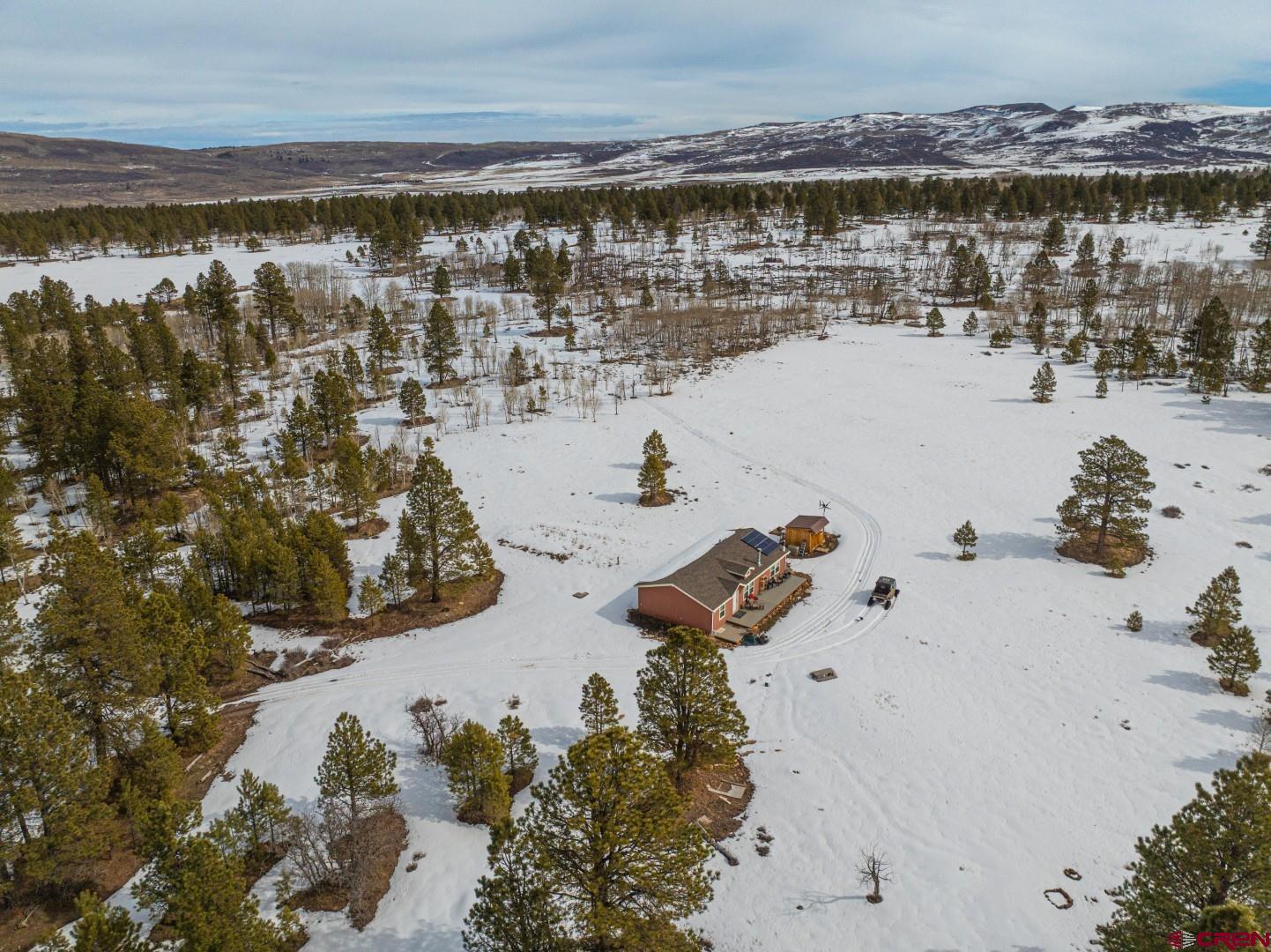 Horsefly Mesa Getaway is a private 35± acre Western Colorado holding defined by a well-built mountain cabin, a natural wildlife pond, and expansive views of the San Juan Mountains. Located in GMU 61 with nearby public land access and thousands of miles of trails across the Uncompahgre Plateau, this property offers a rare blend of comfort, recreation, and self-reliant mountain living  all within close distance to Telluride, Ridgway, Montrose, and Ouray.   • Location & Setting: 35± acres on Horsefly Mesa in GMU 61 with sweeping San Juan Mountain views and strong privacy.   • Cabin Improvements: 1,350± sq. ft. mountain home featuring 3 bedrooms and 2 bathrooms with functional, comfortable living space.   • Power & Utilities: Solar-powered system with back up propane generator, propane heat, wood-burning fireplace, and domestic well water.   • Water Feature: Natural pond serving as a centerpiece of the property, attracting ducks, elk, mule deer, and turkey.   • Recreation & Access: Public land access just down the road with proximity to thousands of miles of trail systems on the Uncompahgre Plateau.   • Regional Convenience: Short drive to Telluride, Ridgway, Montrose, and Ouray while maintaining mountain privacy.      At the heart of the property is a 1,350± square foot cabin. With three bedrooms and two bathrooms, the home provides a comfortable base whether used as a full-time residence, seasonal retreat, or hunting headquarters. The wood-burning fireplace adds warmth and character, while propane heat and solar power with generator backup ensure dependable functionality in all seasons.   The natural pond draws consistent wildlife activity. Elk bugle in the fall, mule deer move through the aspens, and turkeys travel the surrounding ponderosa timber. Located in GMU 61, the property appeals directly to sportsmen seeking proximity to quality hunting units and public land access.   Beyond the boundaries of the ranch, thousands of miles of trails across the Uncompahgre Plateau provide additional opportunity for hunting, horseback riding, hiking, and exploring. The setting captures the essence of Colorado mountain lifestyle, space, views, wildlife, without sacrificing access to the amenities of Telluride, Ridgway, Montrose, and Ouray.   Horsefly Mesa Getaway offers a balanced combination of cabin comfort, usable acreage, water feature, wildlife presence, and recreation access in a proven Western Colorado location. For buyers seeking a true mountain property with both lifestyle appeal and practical infrastructure already in place, this is a compelling opportunity.
