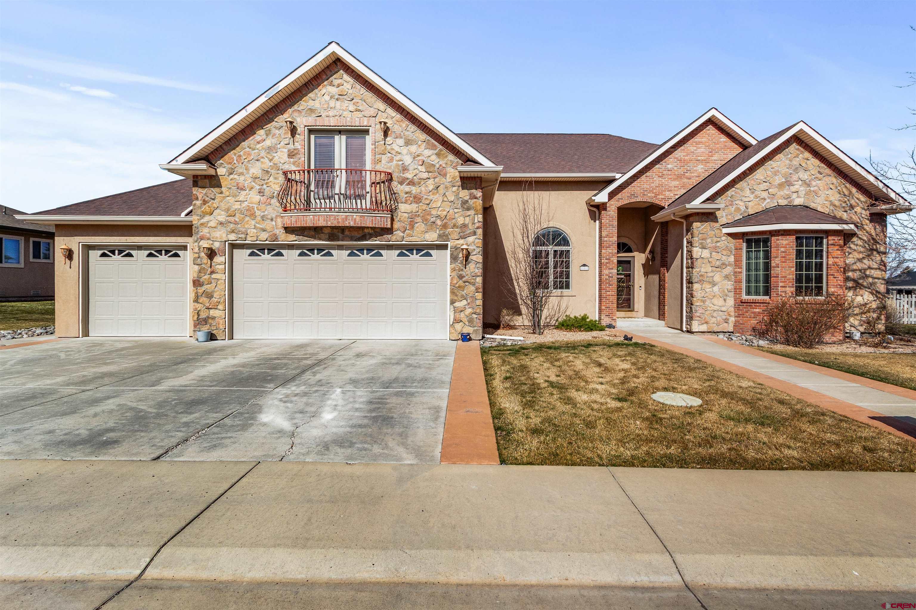 Luxury living meets premier golf course views in this stunning home designed for both comfort and elegance. The striking exterior showcases a sophisticated blend of stone, brick, and stucco, setting the tone for the quality found throughout.  Inside, you’ll find 5 bedrooms, 3 bathrooms, rich hardwood floors, and a spacious open floor plan centered around a large kitchen perfect for entertaining. Two separate living spaces offer flexibility for everyday living and formal gatherings, while the primary suite features its own private outdoor access, creating a true retreat.  Situated on .31 acres along the 14th hole of Cobble Creek, the home also includes a covered porch and a three-car garage.  If you’ve been waiting for a luxury home that delivers space, style, and a premier golf course setting, this may be the one.