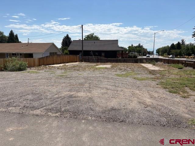Commercial lot for sale in highly sought after downtown Cedaredge location.  This location is Zoned B-1.  Walking distance to shopping and restaurants in the area, and a hub of activity for local artists and entrepreneurs. Twenty minute drive to the Grand Mesa, the largest flat top mountain in the world with 300 plus lakes and reservoirs for year round fun, hiking, biking, fishing, snowmobiling, cross country skiing as well as downhill skiing at Powderhorn Ski resort. Come check us out!  Buyer to verify with the Town of Cedaredge for zoning details.