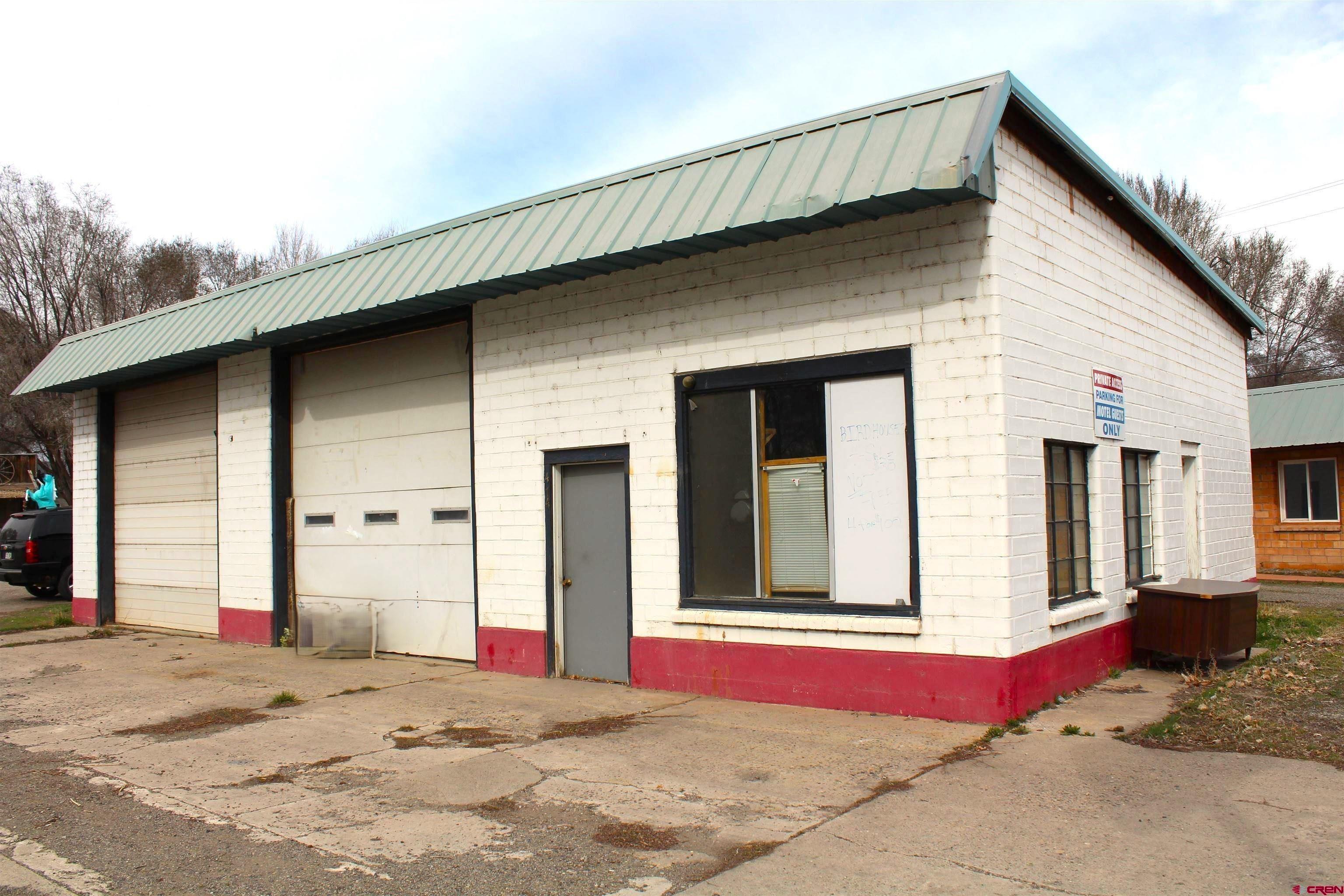This 1,500 sq. ft. shop offers two work bays with overhead doors, a reception/office area and a convenient half bath. The property includes a Town of Hotchkiss water tap and a Town of Hotchkiss sewer tap, and it is being sold As-Is. This could be the location that makes it a rewarding long-term investment.