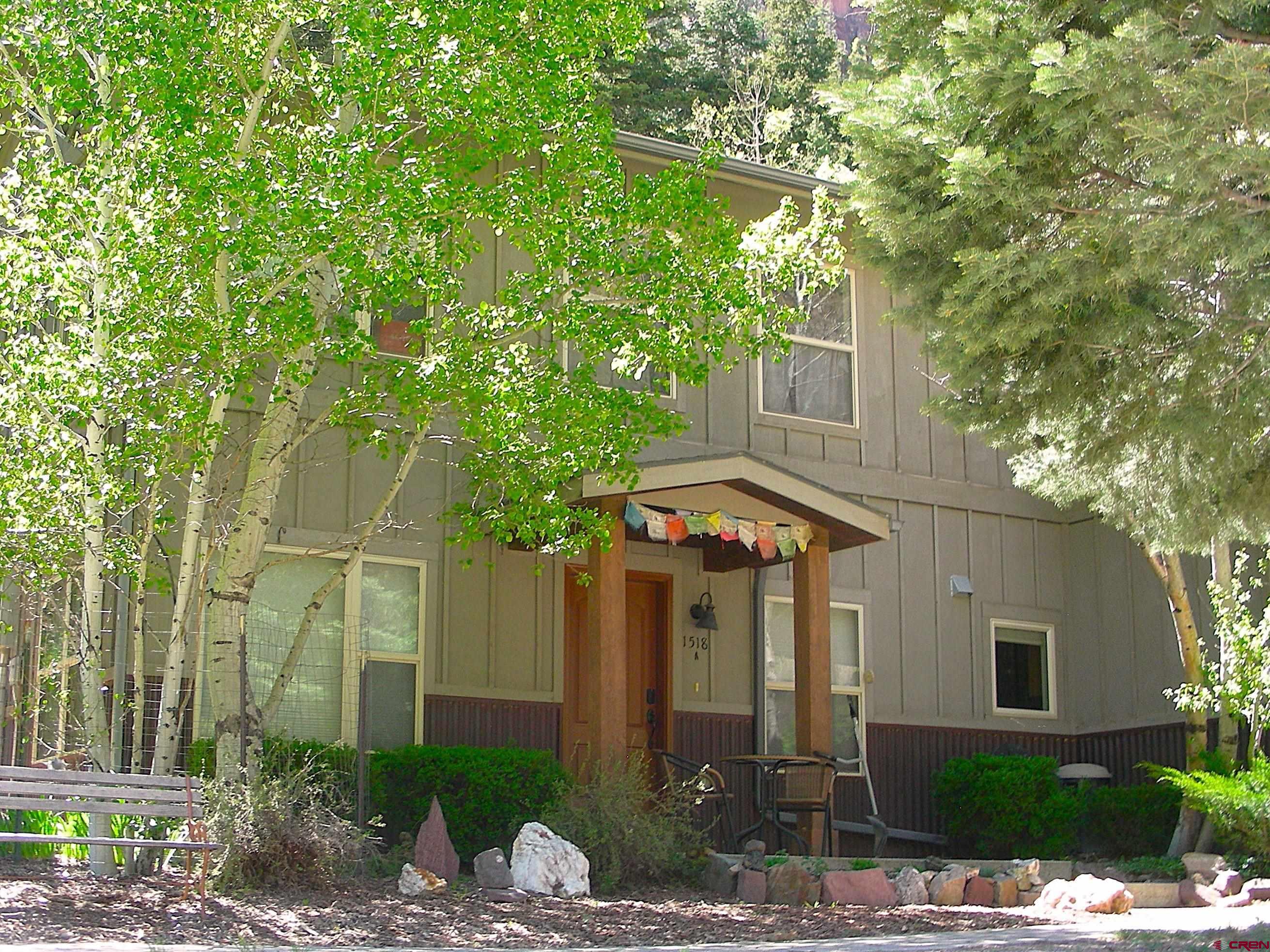 2 Bedrooms | 2 Full Bathrooms | Single-Level Living PROPERTY OVERVIEW Perfectly positioned directly across from the celebrated Ouray River Walk Trail—a tranquil two-mile scenic loop with stunning views of the San Juans. Historic downtown Ouray, the Ouray Hot Springs, and Fellin Park are all approximately half a mile away. INTERIOR FEATURES This thoughtfully designed home offers an open-concept, single-level floor plan that flows seamlessly from the gourmet kitchen through the dining area into the welcoming living room, creating an ideal gathering space for family and friends. 9' ceilings give the home a spacious feel and the warm oak laminate enhances the mountain feel. There is a workbench with cabinets in the garage for those special projects. Kitchen & Living: Fully equipped kitchen ready for entertaining. Primary Bedroom Suite: Queen bed with built-in storage drawers and a full ensuite private bathroom. Second Bedroom: Queen bed plus elevated loft full bed sleeping up to four, dedicated Smart TV, and a second full bathroom conveniently located just outside the door. Additional Amenities: Stackable washer and dryer, dog-friendly, naturally cool at elevation and easily managed with fans and evening ventilation. LOCATION & DISTANCE GUIDE Stunning panoramic views and a peaceful, tucked-away setting while remaining close to everything Ouray has to offer. Ouray River Walk Trail -- across the street / Historic Main Street Ouray (shops & restaurants) -- 1.3 miles / Ouray Hot Springs Pool -- 0.7 miles / Box Canyon Falls Park -- 2.3 miles / Cascade Falls Park -- 2.5 miles / Perimeter Trail Access (Main Street Trailhead) -- 2.0 miles / Bear Creek National Recreation Trailhead -- 3.6 miles / Yankee Boy Basin Trailhead -- approx. 10.5 miles (via Camp Bird Rd, 4WD recommended) / Red Mountain Pass -- 13 miles / Telluride Ski Resort -- scenic 60-minute drive. ABOUT OURAY, COLORADO Ouray, Colorado, nestled at 7,800 feet in the heart of the San Juan Mountains, is a year-round outdoor paradise known as the "Switzerland of America." Spring, summer, and fall bring world-class hiking, ATV riding, mountain biking, rock climbing, horseback riding, and fishing, along with the beloved summer music series in Fellin Park. Winter transforms Ouray into an ice climbing and back-country activity mecca.Year-round, residents and visitors alike enjoy a vibrant downtown filled with acclaimed restaurants, craft breweries, distilleries, live entertainment venues, and the ever-popular Ouray Hot Springs, making this one of Colorado's most desirable mountain communities. Property is currently a successful short term vacation rental.