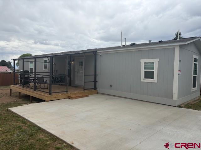 Like new 2024 manufactured home features 3 bedrooms, 2 full baths, offers you a choice of having it furnished or not.  The home is currently staged with beautiful furniture and decor, which all may be purchased separately.  The home is very spacious and with the additional front deck area will give you additional elbow room, should you need it. The home is equipped with whole house environment, smart control heating and cooling and brand new appliances, washer and dryer as well.  The home is situated on its own lot in town, close to all town amenities. Come take a look.