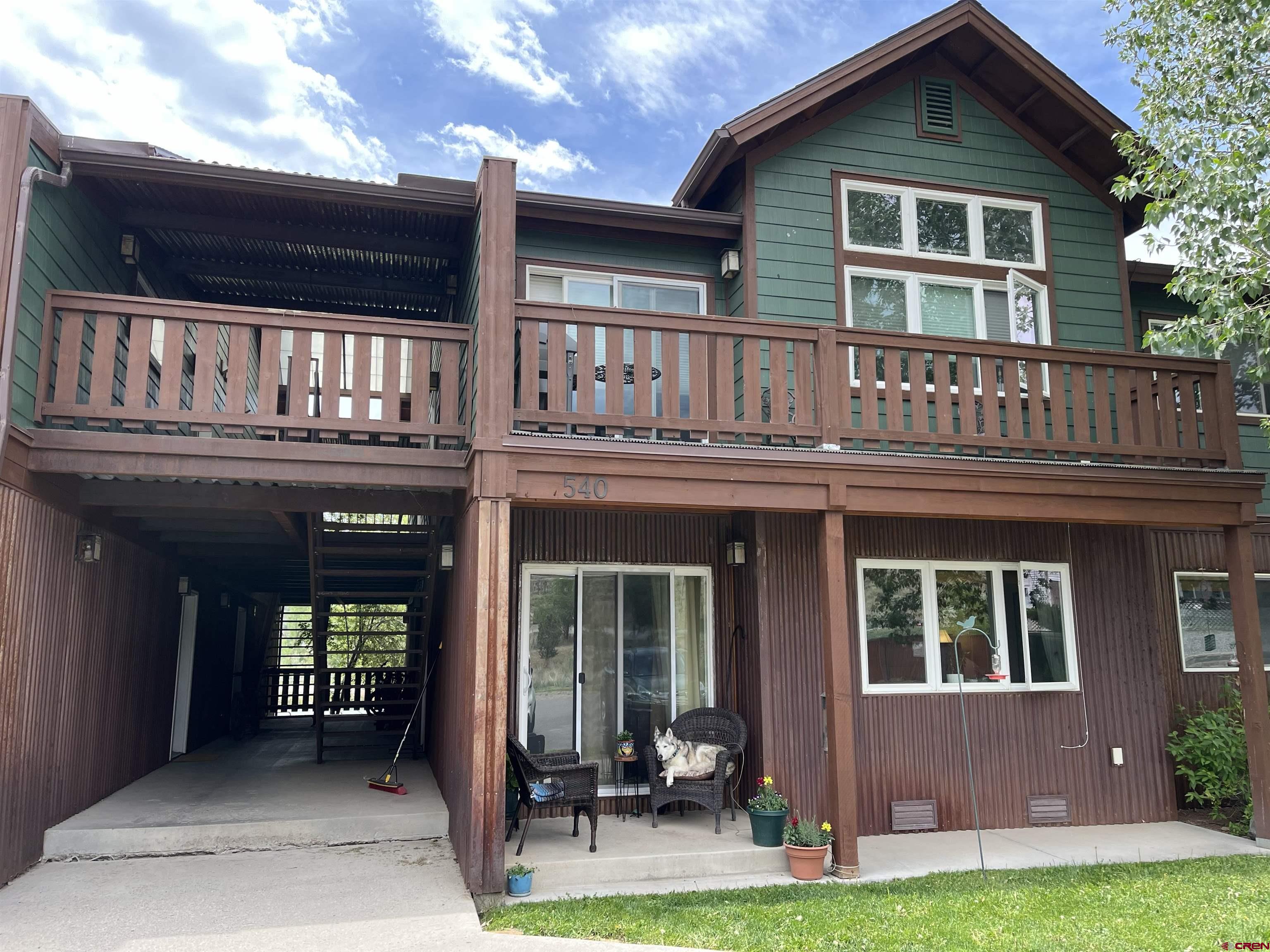 Charming 1 bedroom, 1 bath, lower level Condo in Building E with detached carport & locked storage. Clean unit with hardwood flooring and granite counters. Includes all kitchen appliances plus newer washer and dryer. Very affordable for first time home buyers or perfect rental property. Nice covered patio and walking distance to downtown Ridgway.  (currently rented month to month)