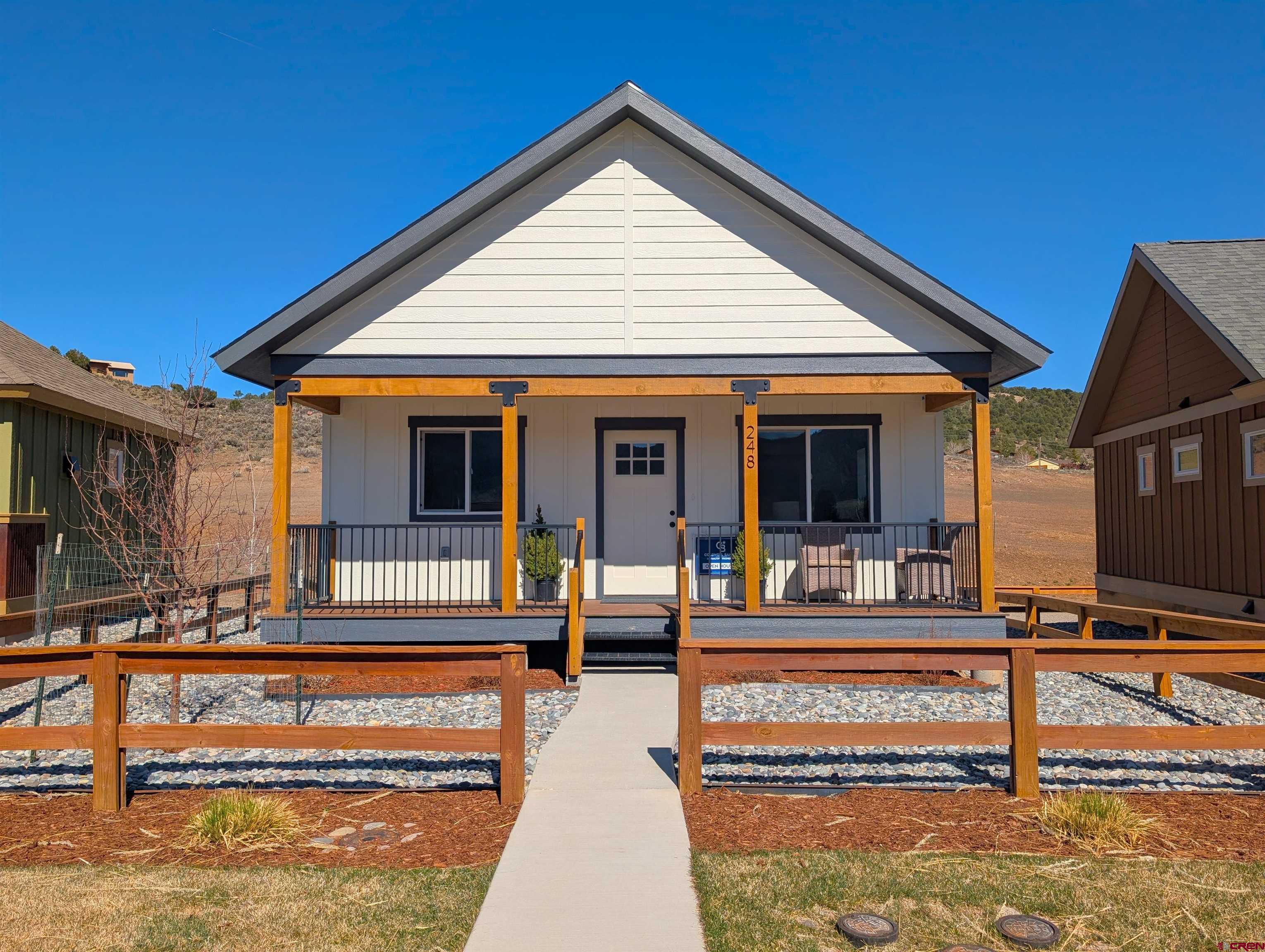 Very well designed cottage community. These are single family homes with the benefit of an HOA.This home is brand new and complete. Friendly for dogs and people. Mini split heating/cooling systems. Bio fuel fireplace. Plenty of latitude for your own gardening choices. Stick built on foundation. R 19 Insulation. One assigned parking space and one assigned 6'x8'x8' storage space. Clubhouse has a large adjacent patio with oversized hot tub. Walk or bike to the center of Ridgway town for shopping,restaurants,galleries and a summer farmer's market.