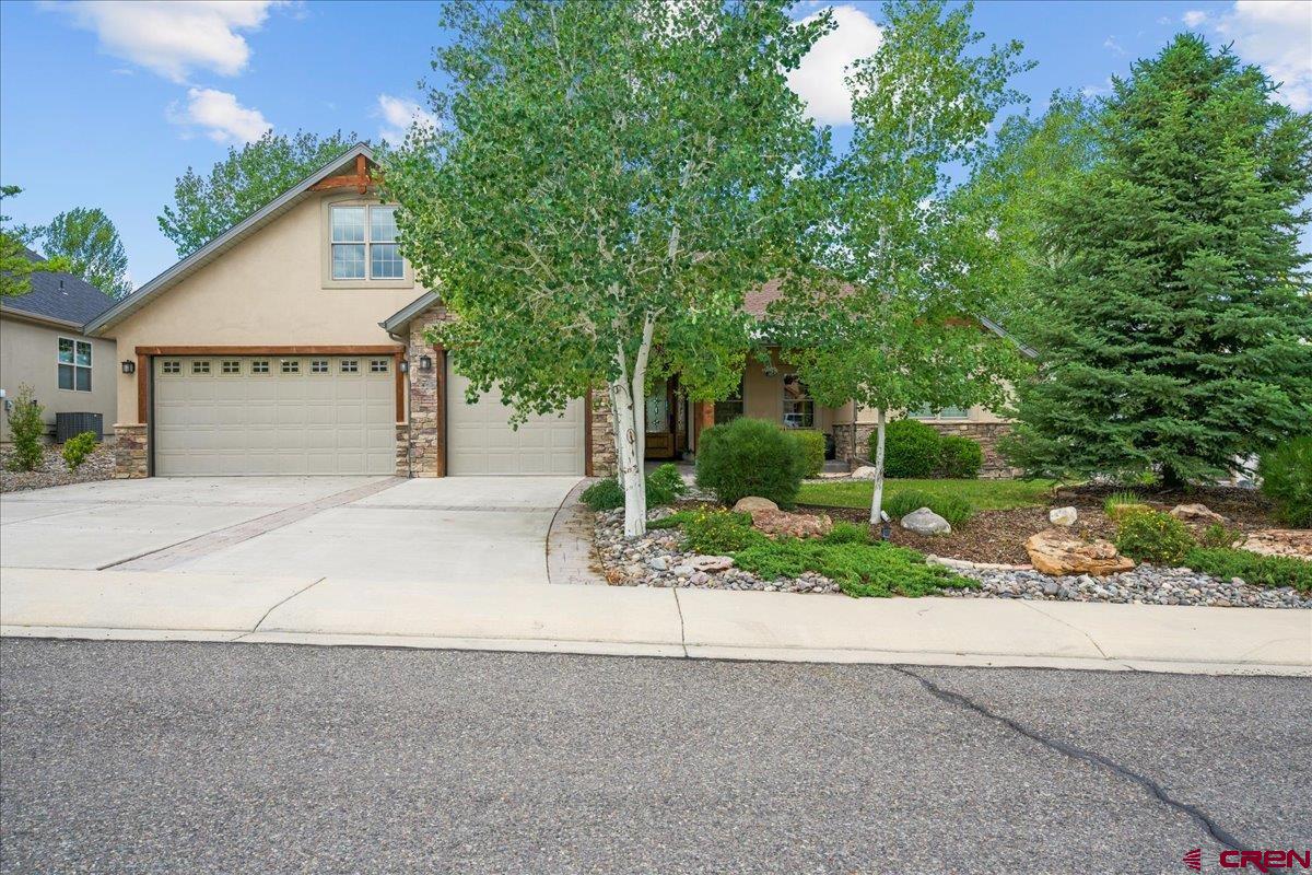 Back on market due to NO Fault of the seller. Elegance and warmth greet you in this beautifully updated 3-bedroom, 3-bath home in the desirable Brown Ranch community. The tastefully remodeled modern kitchen features marble countertops, a seating bar, Bosch appliances, custom cabinetry with soft-close drawers, and abundant storage. The inviting living area showcases a stunning gas fireplace, soaring beam ceilings, and plentiful natural light.  The spacious primary suite offers private access to the back patio, a linen pantry, and a large walk-in closet with built-in shelving. The luxurious primary bath delivers a spa-like experience with an oversized glass walk-in shower, Japanese soaking tub, dual vanities, in-floor radiant heat, and a smart commode. A generously sized secondary bedroom on the main level also features a large glass walk-in shower, smart commode, and additional storage closet.  Additional highlights include engineered hardwood floors, a well-appointed laundry room with counter space, cabinetry, and utility sink, plus a privately situated upstairs bedroom and bath ideal for guests or a home office. The property also includes a 2-car garage along with an additional smaller garage/workshop area complete with built-in cabinets and counter space.  Enjoy the peaceful back patio and fenced yard overlooking the beautifully maintained common area walking path and open space beyond. All appliances are included, and some furnishings may be negotiable.