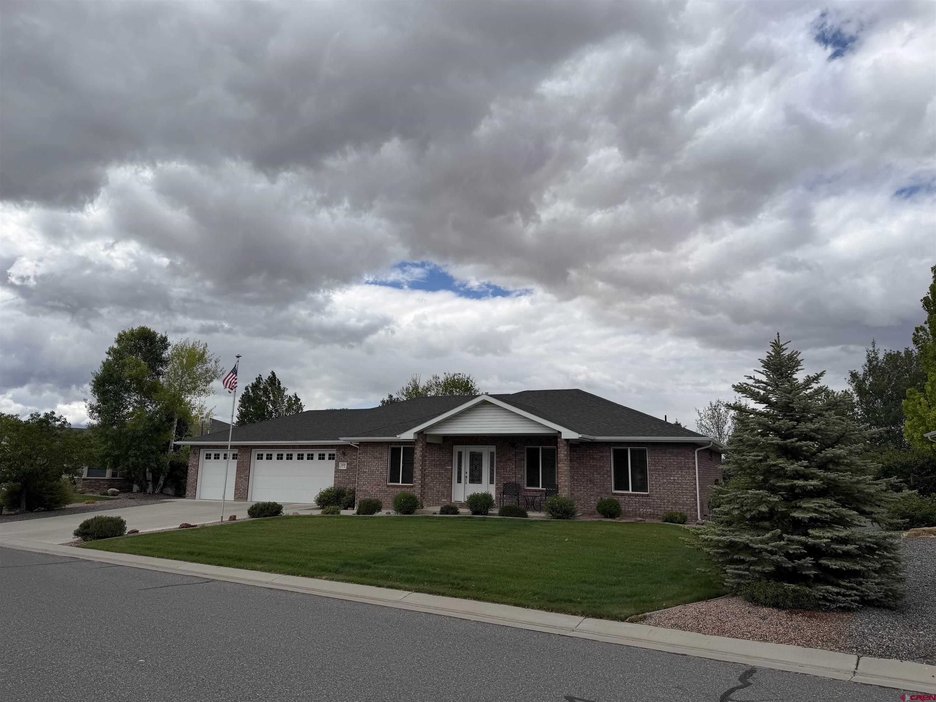 Well-maintained three-bedroom, two-bath residence with a dedicated office, offering a functional and inviting floor plan. Interior features include oak hardwood flooring, carpet, and tile throughout. The home also includes an oversized three-car garage with additional storage space.  The exterior is beautifully landscaped and equipped with a sprinkler system, irrigation pump and irrigation water provided through the HOA for only $75 annually. Additional improvements include a brick storage shed on a foundation with electricity and split rail fencing enclosing the backyard. The property backs to an open field, providing added privacy and peaceful views.  The hot water heater was replaced two years ago. This property has been exceptionally cared for and is in excellent condition.