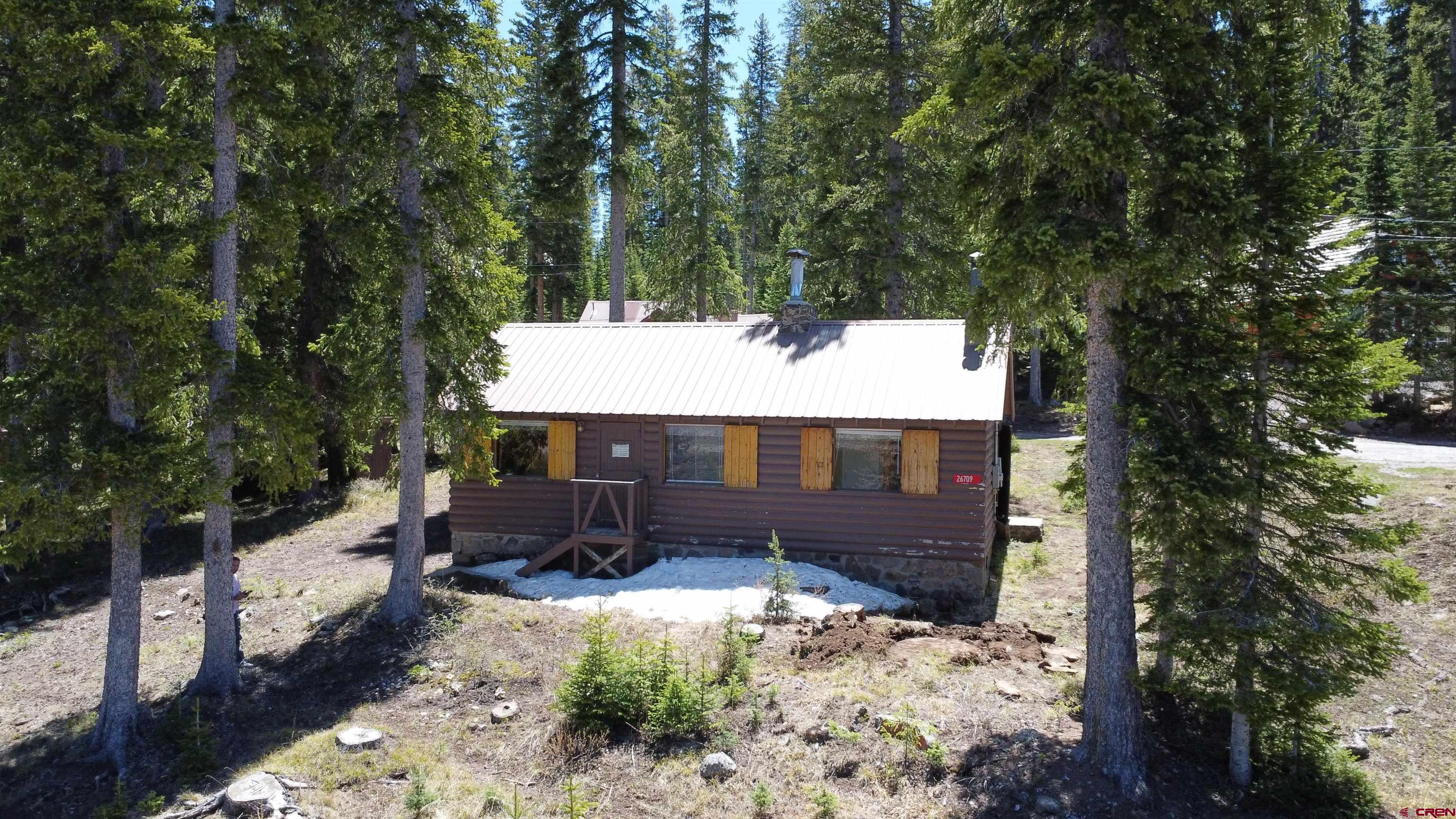 Part of the Grand Mesa Resort area, sitting at an elevation near 10,000 feet, right off the Grand Mesa lakes and trail networks. This 512 square foot, fully furnished cabin is ready for new owning to enjoy the Fantastic view of Twin Lake.   There are two bedrooms and a 3/4 bath, a rock fire place and a spacious kitchen to enjoy your time on the Mountain. It doesn't get much better than this!