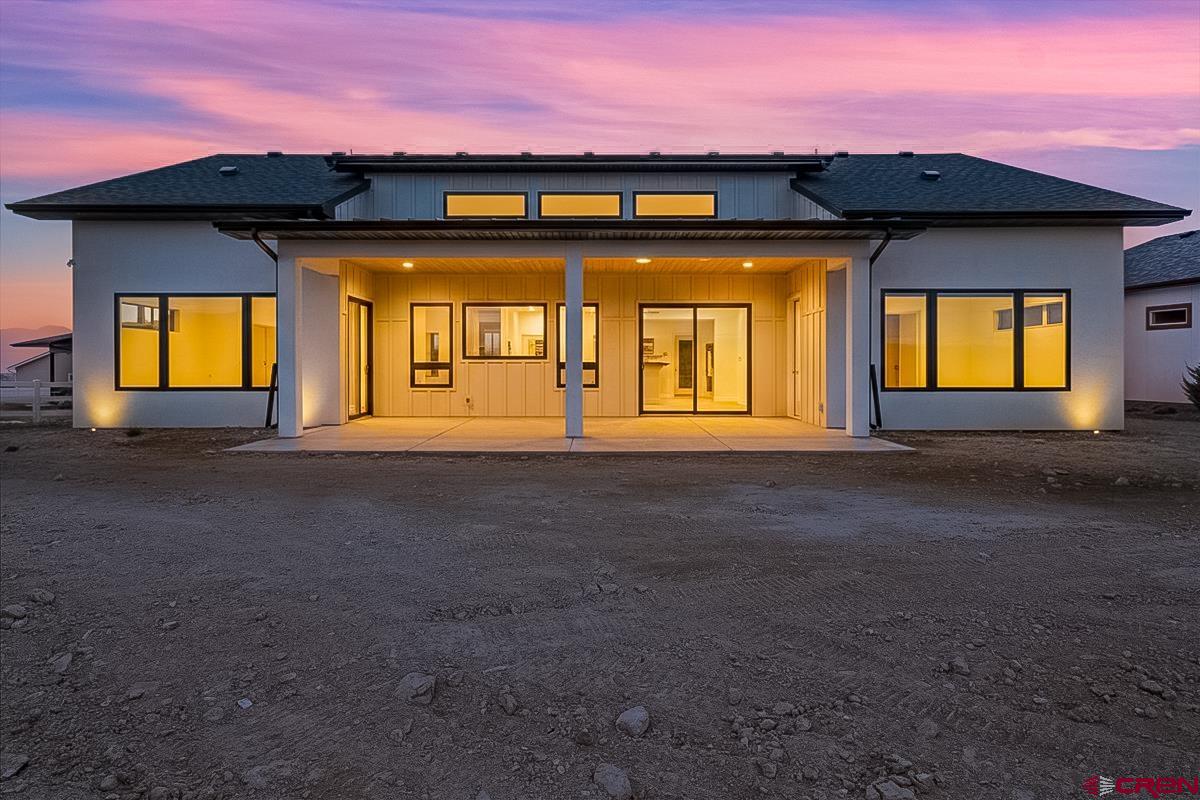 Perched high above the Uncompahgre River with commanding views of the San Juan Mountains, this newly built single level home boasts four bedrooms, four bathrooms, separate laundry room and oversized garage. Three of the  bedrooms have their own en suite bathroom, walk-in closet and gorgeous views. The kitchen is equally impressive, featuring high quality custom made cabinetry, spacious walk in pantry, Bosch appliances and quartz countertops.  This home is true to the quality, design and opulence you expect from a Coker built home.  An abundance of natural light warms the great room and both primary and secondary bedrooms. Hickory hardwood flooring creates an impressive look and feel.    This is truly one of a kind home. Relax on your covered patio while you enjoy the unsurpassed views of the San Juan Mountain Range. There is additional room for your Recreational vehicles in the oversized attached three car garage. Shopping, the Montrose Recreation Center and endless outdoor amenities await you from this convenient location. Whether you're seeking a serene retreat or a functional property to accommodate your Colorado lifestyle, 3618 Ridgeline Drive offers the perfect blend of luxury, comfort and natural splendor. Come see it today!   Some photos of this listing may include virtually staged amenities, furniture or fixtures.