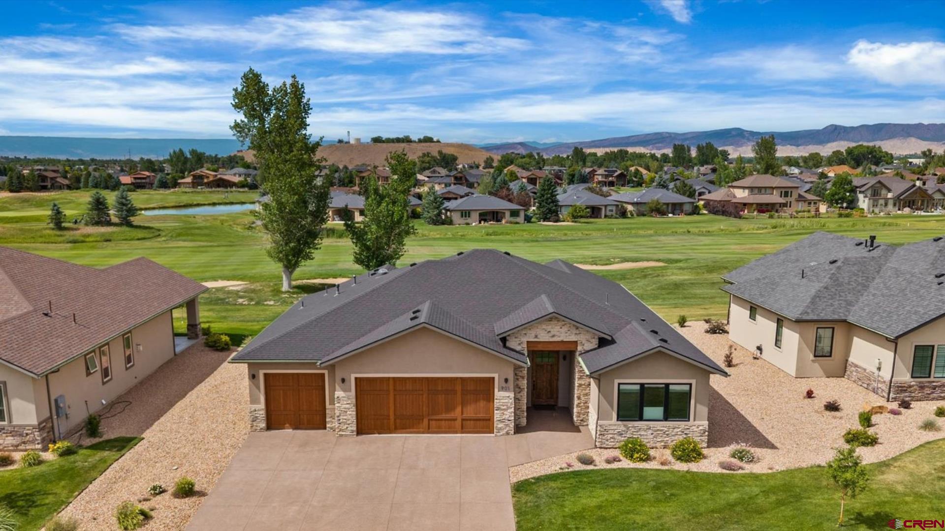 Dazzling Patio Home Offering with Gorgeous Golf Course Views, High End Finishes, and Complete with The Low-Maintenance, Easy Lifestyle of Your Dreams! Perfectly placed within the desirable neighborhood of Cobble Creek, this home delivers everything you're looking for and more. Step inside to character-rich finishes throughout, a versatile floor plan, high-end craftsmanship and the evidence of a high attention to detail throughout. The kitchen features on-trend, modern wood cabinetry, an abundance of storage and counter space, an ergonomic layout, and a great design to host and entertain. A fantastic selling point of this home is that it provides the main en-suite, and an additional 'lock off' suite which is the perfect haven for giving your loved ones privacy and comfort when they visit. The main en-suite delivers a huge walk-in closet and serene views of the golf course and beyond. The garage provides an ideal haven for tinkering and projects, and would also accommodate larger vehicles with ease (240amp power included!) Also included is a large laundry/utility room with extra storage and cabinetry, and is the perfect spot for keeping the mess out of sight. This home capitalizes on and epitomizes indoor-outdoor living to a tee. The covered and spacious back patio is the ultimate oasis for supreme relaxation; your favorite beverage will hit differently as you survey lush golf course landscapes and stunning fairway views, as golfers meander their way down the long, expansive hole 6 par 5. Enjoy a low-maintenance lifestyle with landscaping/snow removal handled for you, allowing you more time and energy to enjoy all the incredible amenities in Cobble Creek, Montrose, and the Western Slope in general. Experience quick access to a budding restaurant and brewery scene, unmatched healthcare, big box and boutique shopping alike, and the joy of a blooming community of wonderful, inclusive personalities which have made Cobble Creek the place to be for decades. A short walk to the clubhouse provides a full-service bar and restaurant, as well as a lavish spa, yoga studio, gym, pro shop, and golf simulator. Mile upon mile of bike trail and singletrack with beautiful vistas are directly adjoined to the neighborhood, enabling you to be healthy and love the outdoors without the crowds, headaches, and drama. Live the good life in Montrose with unmatched weather and seasonal beauty, which also provides consistent, year-round golf opportunities. Embrace a Convenient, Yet Elevated Lifestyle in This Masterpiece Home on a Golf Course Surrounded by the Rocky Mountains; Experience it For Yourself Today!