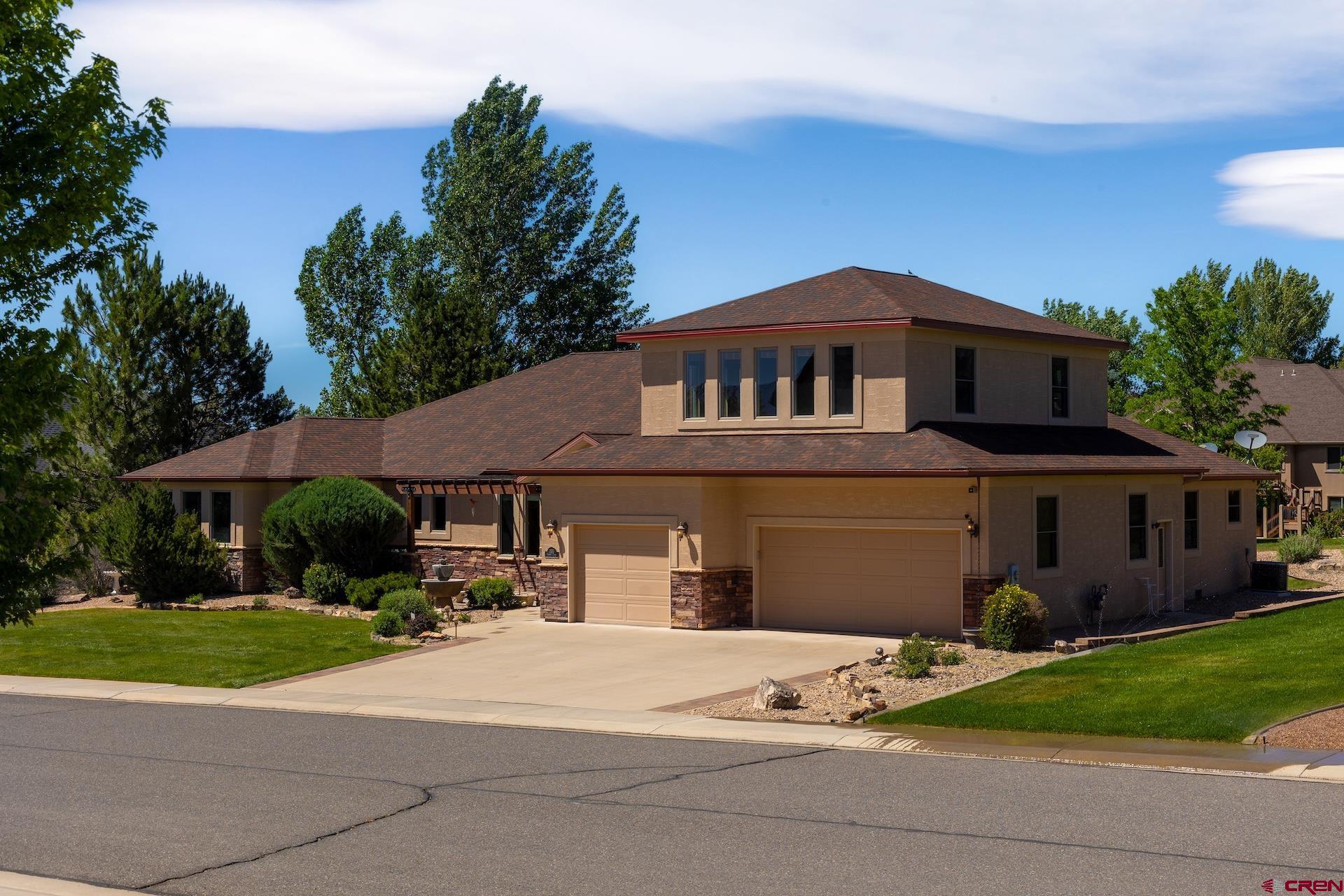Located on one of Montrose's most desirable streets, this exceptional 4,300± sq. ft. home offers the perfect blend of quality craftsmanship, spacious living, and beautiful outdoor surroundings. Wonderfully manicured landscaping, a picturesque pond on open space right near the backyard, and an oversized three-car garage create stunning curb appeal from the moment you arrive.  A handcrafted front door welcomes you into a thoughtfully designed interior featuring multiple living and dining spaces, ideal for both everyday living and entertaining. The well-appointed kitchen boasts custom cabinetry, dual ovens, and abundant workspace for the home chef.  The expansive primary suite is a private retreat, complete with a generous walk-in closet and a luxurious en-suite bath featuring a jetted soaking tub, separate shower, and dual vanities. Two additional main-level bedrooms are filled with natural light and share a full bathroom.  Above the garage, a versatile bonus room with its own full bathroom offers endless possibilities—create a fourth bedroom, home office, media room, fitness space, or bunk room to fit your lifestyle.  Outside, enjoy beautifully maintained grounds with the added benefit of irrigation water included in the HOA dues, making it easy to keep the lawn, landscaping, and garden thriving throughout the season.  This well-built home has been thoughtfully maintained and is move-in ready, with the opportunity to personalize it and make it your own. Easy to show—schedule your private tour today!