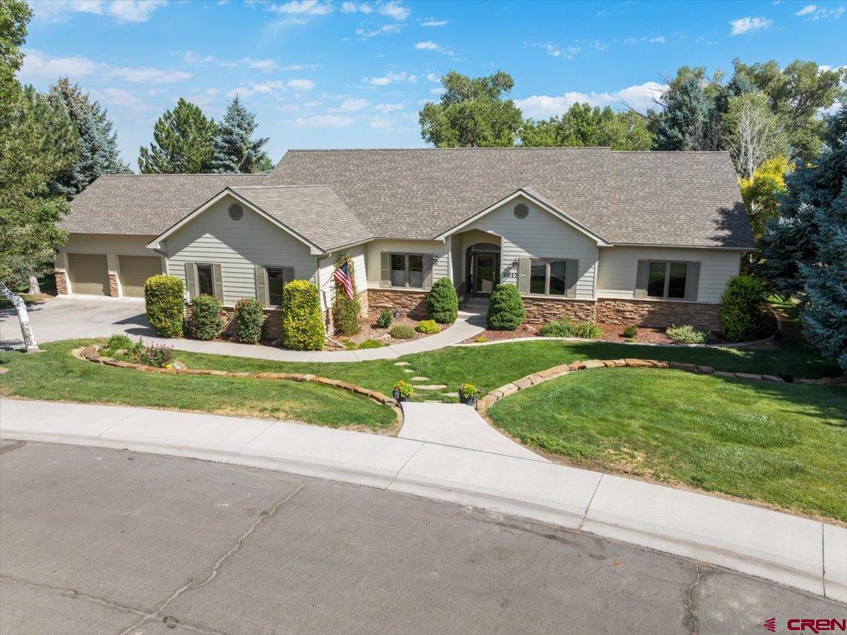 This beautiful ranch style home is very spacious featuring two private primary suites. The open floor plan has newly refinished hardwood floors throughout, and a stunning stone fireplace that sits as a main centerpiece. The expansive floor plan also incudes a versatile bonus room, perfect for a home office, media room, play area, or fitness space that sits above an extra deep 3 car garage. Outside you'll enjoy a maturely landscaped private backyard with a covered patio, water feature, and jetted hot tub. This wonderful property is perfectly located! It offers the perfect combination of quiet country setting, while being minutes from town, and everyday amenities.