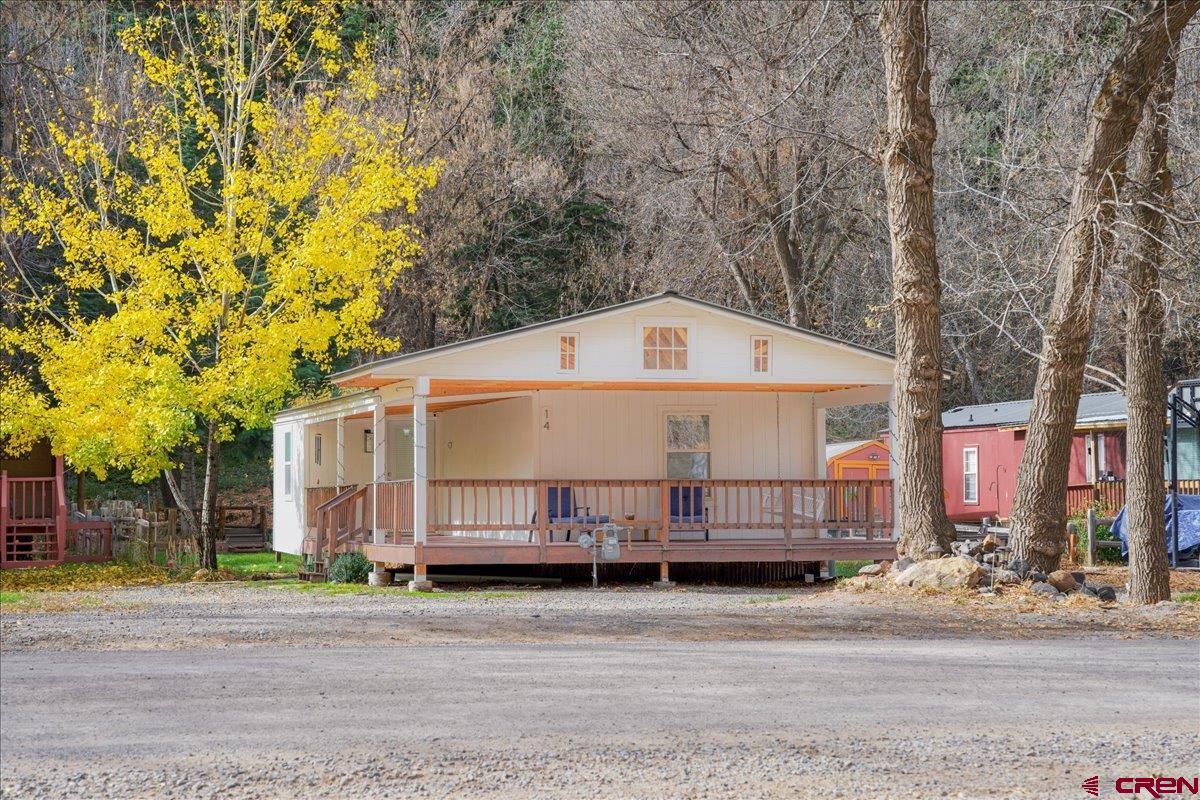 Affordable Elegance in the City of Ouray! This beautifully remodeled manufactured home is ideally located just one mile from downtown Ouray. Enjoy unobstructed river views right across the street, all while being surrounded by the stunning San Juan Mountains. Outdoor recreation is right at your doorstep, with hiking trails just a short walk away in the summer and a two-mile riverside walking and cross-country ski trail just outside the door. Inside, beautiful new flooring, remodeled bathrooms, an updated laundry room, and refreshed living areas create a modern, upscale feel throughout. The peaceful setting and scenic surroundings make this a wonderful place to look forward to coming home to. Call today to schedule your showing!