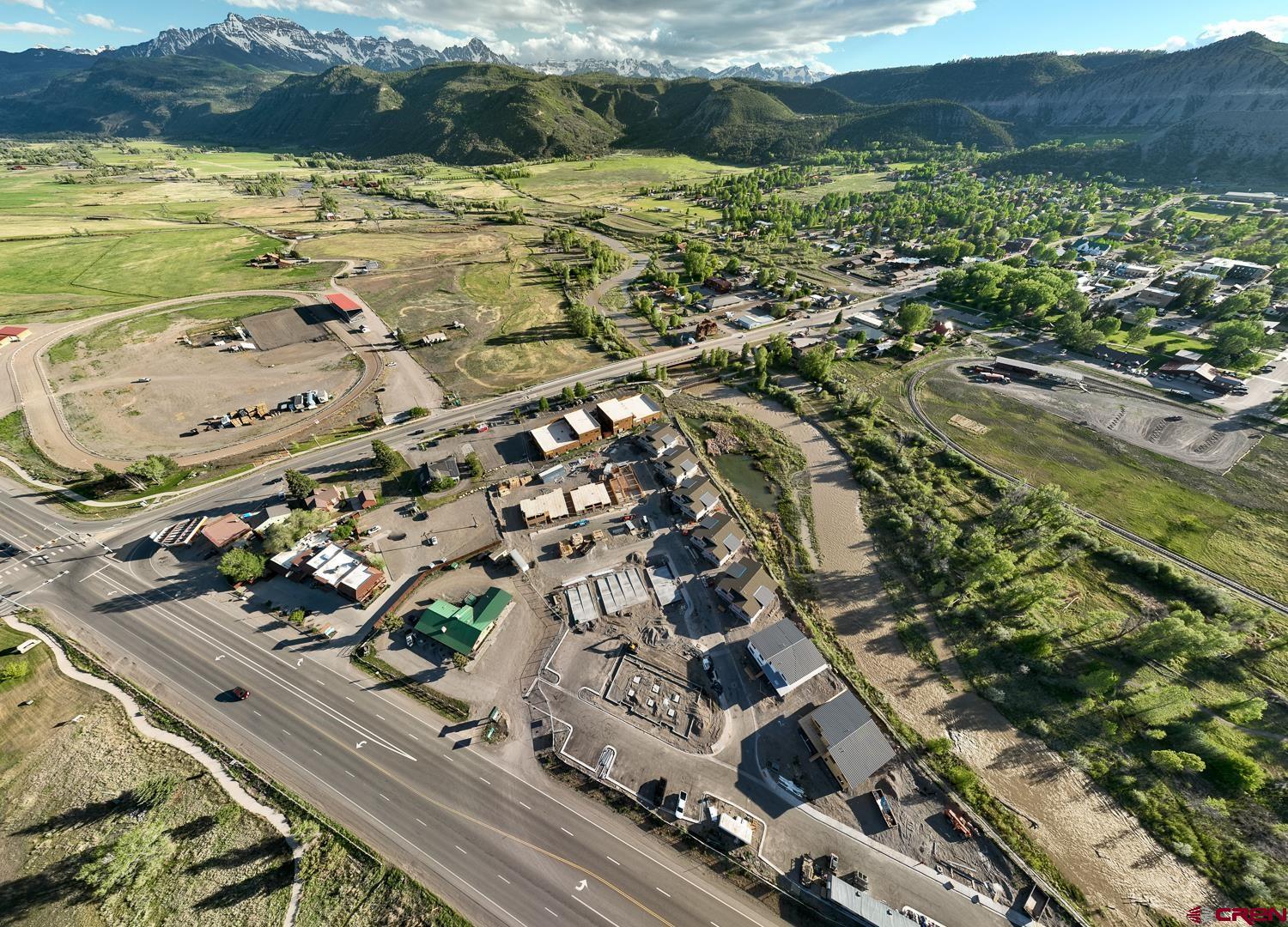 Perfectly situated as the only Ridgway residential project on the Uncompahgre River, Riverfront Village offers quick highway access to Telluride, Ouray, Silverton, and Montrose while a stroll down the river trail leads to downtown shops and restaurants.  This unit has huge direct Box Canyon views into Ouray, a two-plus car garage, Air Conditioning, south south-facing deck, No shared walls, and is located on the third floor.