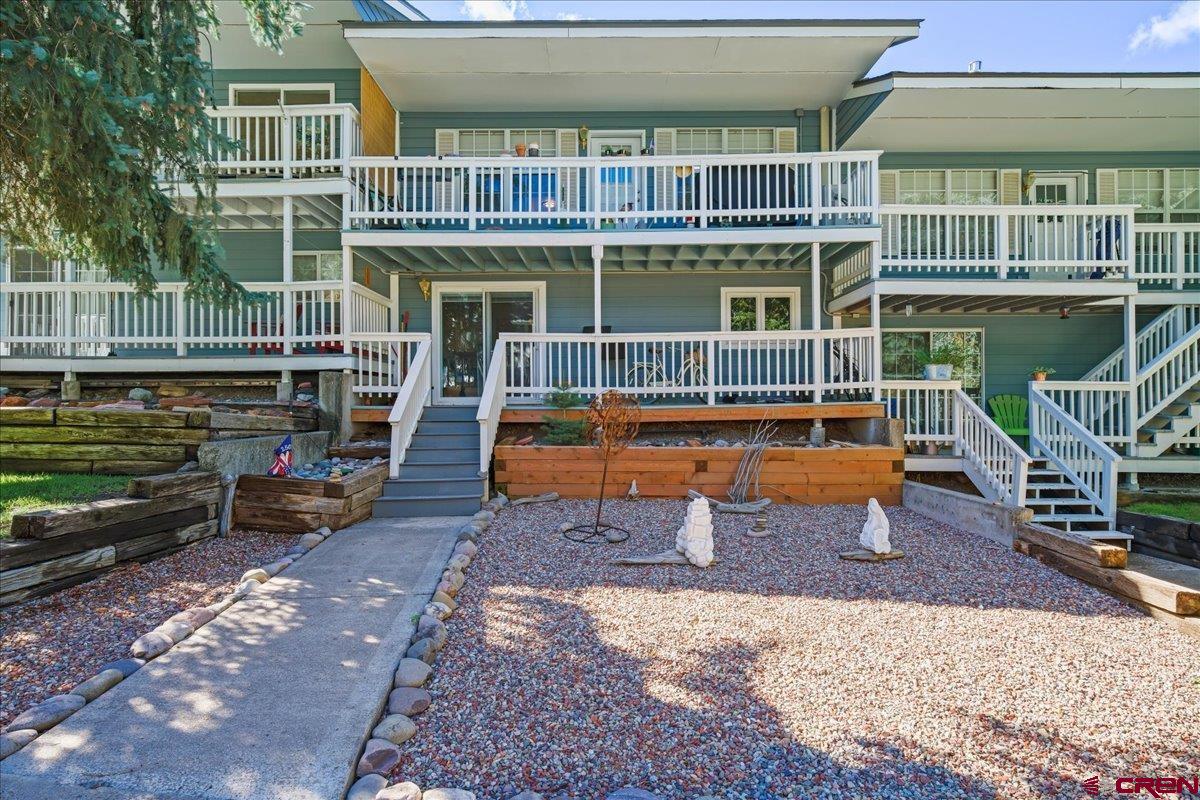 Lovely Townhome with Extensive Upgrades and Gorgeous Mountain Views!  This beautifully upgraded townhome is in like-new condition and offers the perfect combination of comfort, style, and mountain living. The owner has completed numerous recent upgrades, including a large deck off the back of the home that takes full advantage of the incredible views of the mountains surrounding Ouray.  The kitchen has been beautifully updated with granite countertops and new appliances. The primary bedroom has been remodeled and features a new bathroom and a spacious walk-in closet with a skylight. The roof was replaced just a couple of years ago, and solar was added at the same time. Natural gas was also brought to the property, and a lovely gas fireplace was added to the living area. Mini-split systems provide both air conditioning and additional heat.  The primary bedroom and main living spaces are located on the upper level, which features two decks, including one covered deck. The lower level offers two bedrooms, one bathroom, laundry, and another covered deck, providing plenty of space for family and guests.  This home is being offered fully furnished and is truly move-in ready. Whether you're looking for a convenient lock-and-leave property, a full-time residence, or a mountain getaway, this townhome is an excellent choice.  The beautifully maintained grounds, peaceful setting, and spectacular mountain views create the perfect mountain retreat or place to call home. Don't miss the opportunity to make this exceptional Ouray townhome your own. Give us a call today to schedule your private showing!
