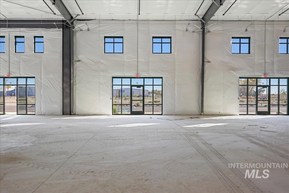 Spare room with a towering ceiling