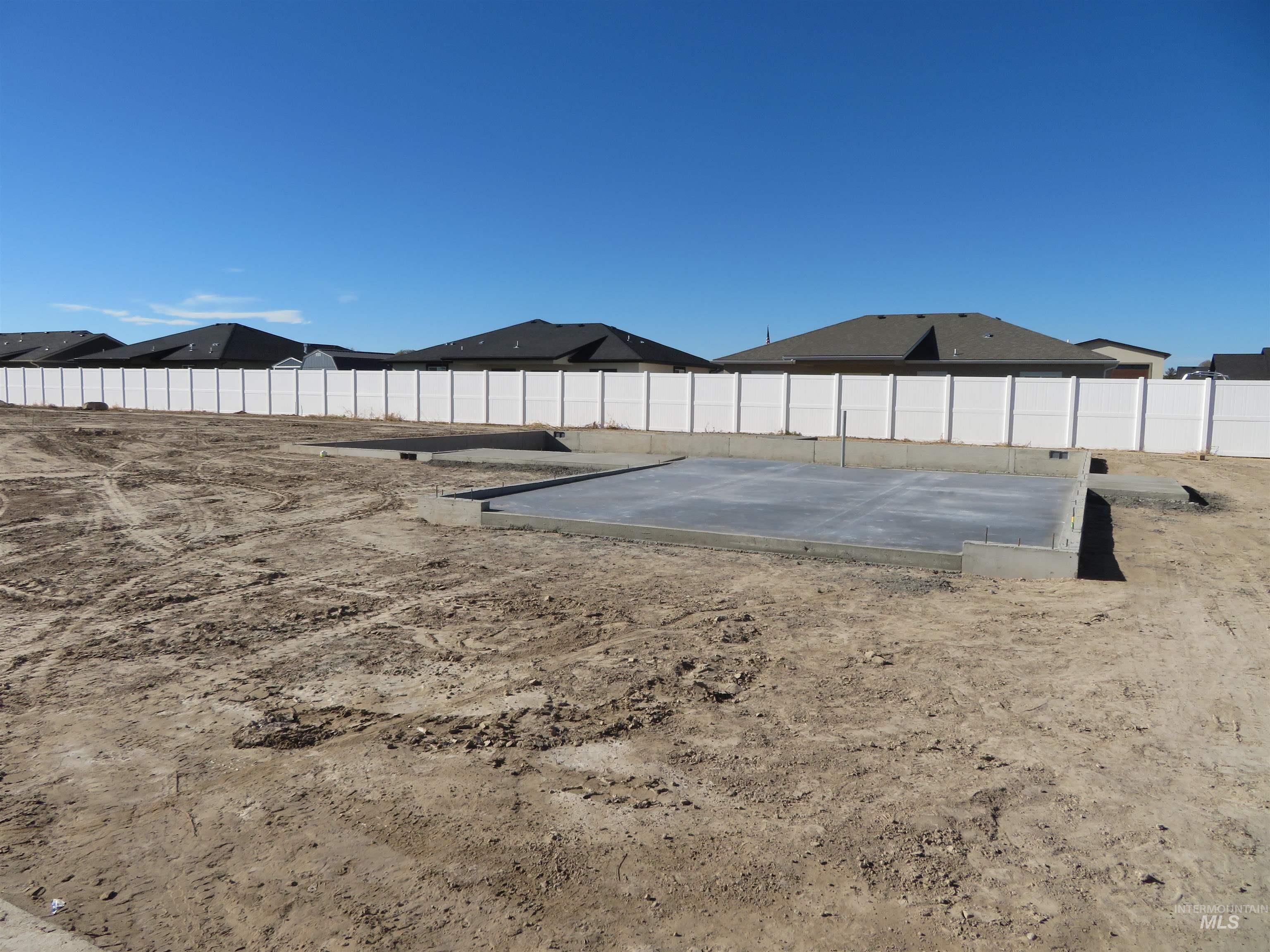 View of fenced backyard