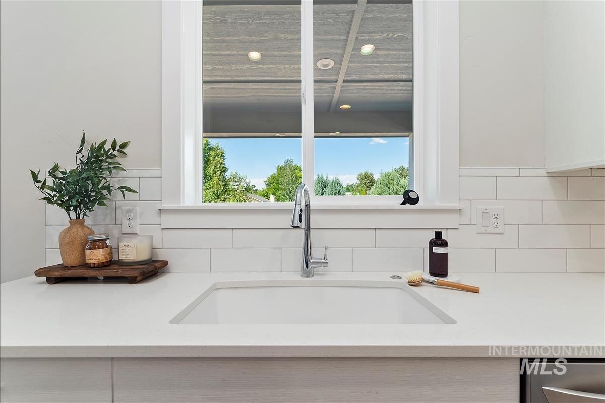 Kitchen view of light countertops