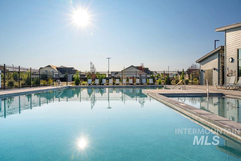 Community pool with a patio area