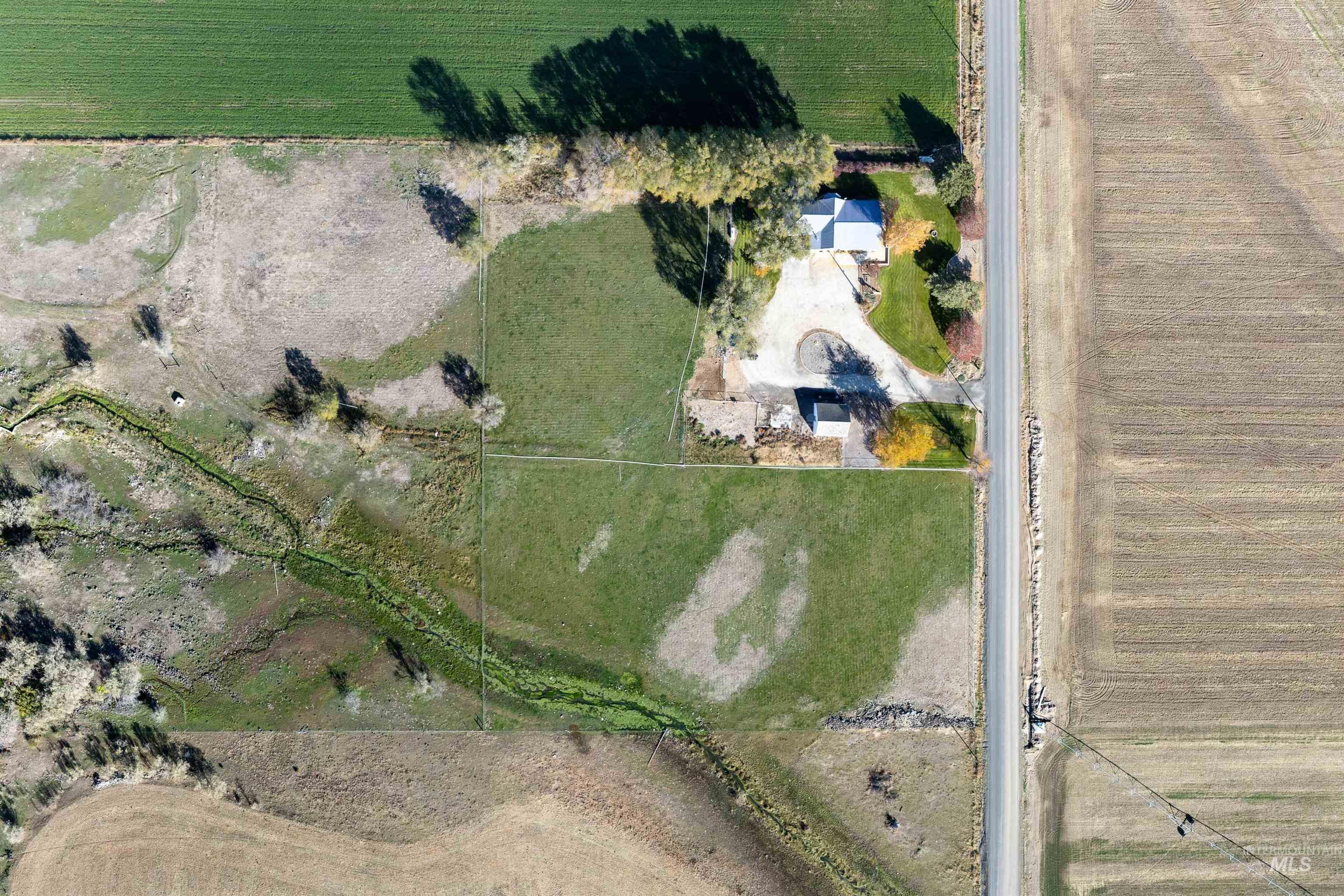 Aerial view of property's location featuring rural landscape