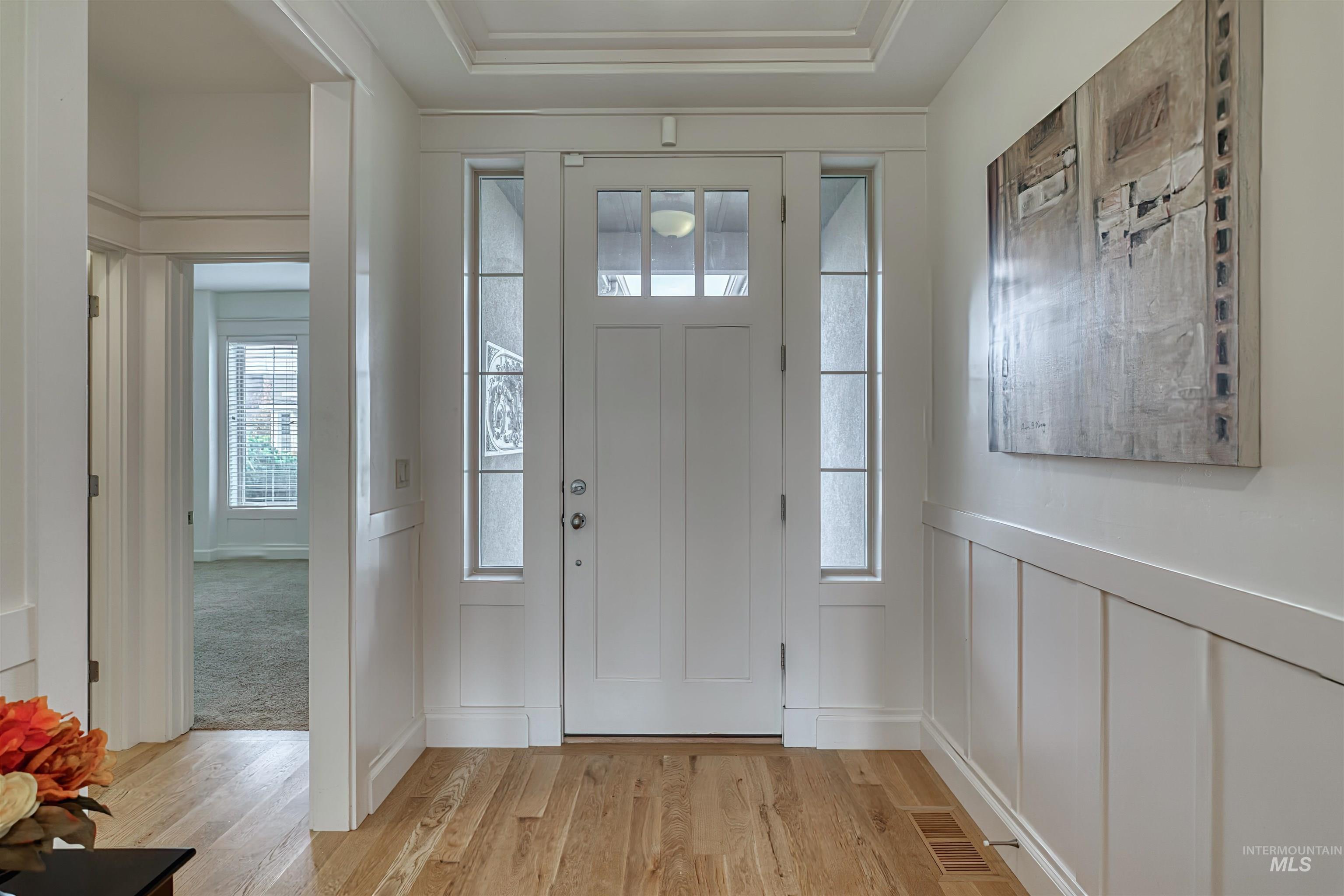 Foyer entrance featuring light wood-style flooring