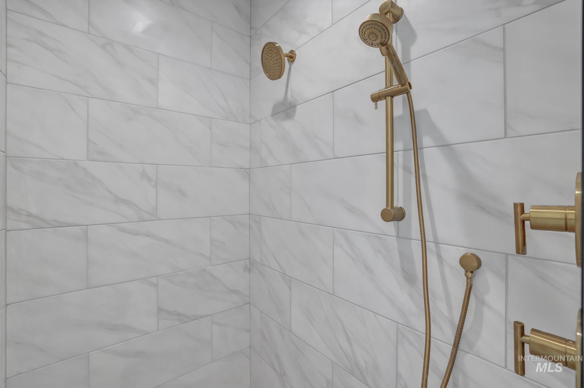 Bathroom view of tiled shower