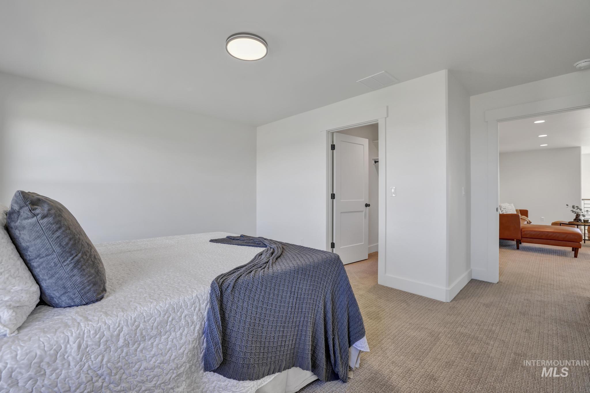 Bedroom featuring carpet flooring and recessed lighting