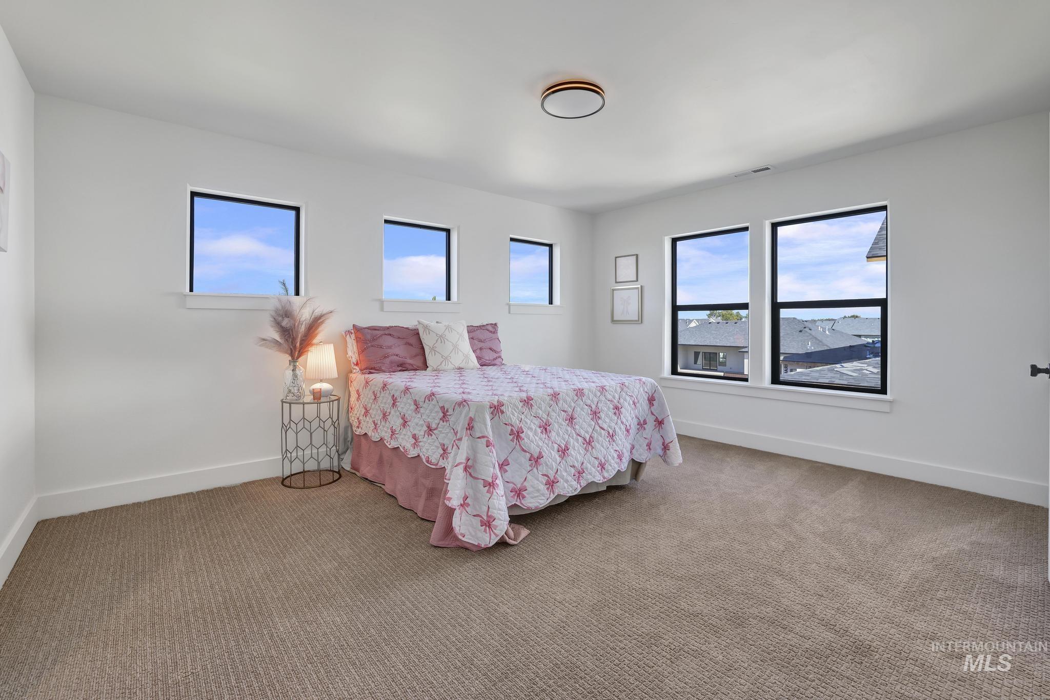 Bedroom featuring carpet flooring