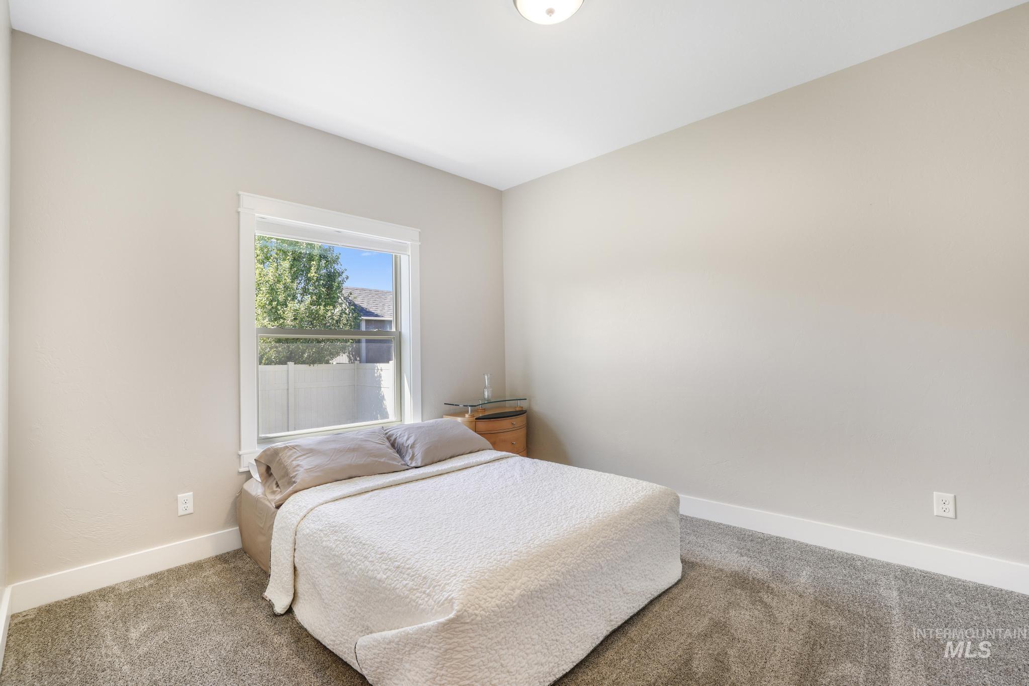 Bedroom featuring carpet