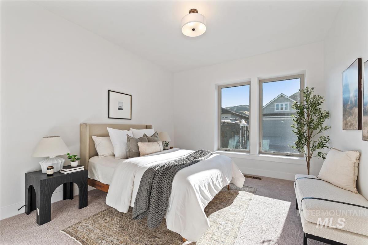 Bedroom featuring carpet flooring