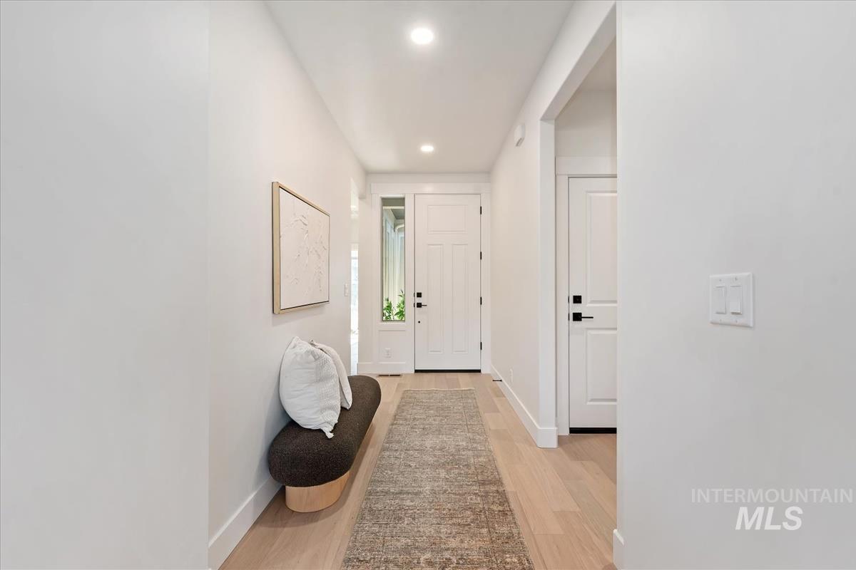 Entryway featuring recessed lighting and light wood finished floors