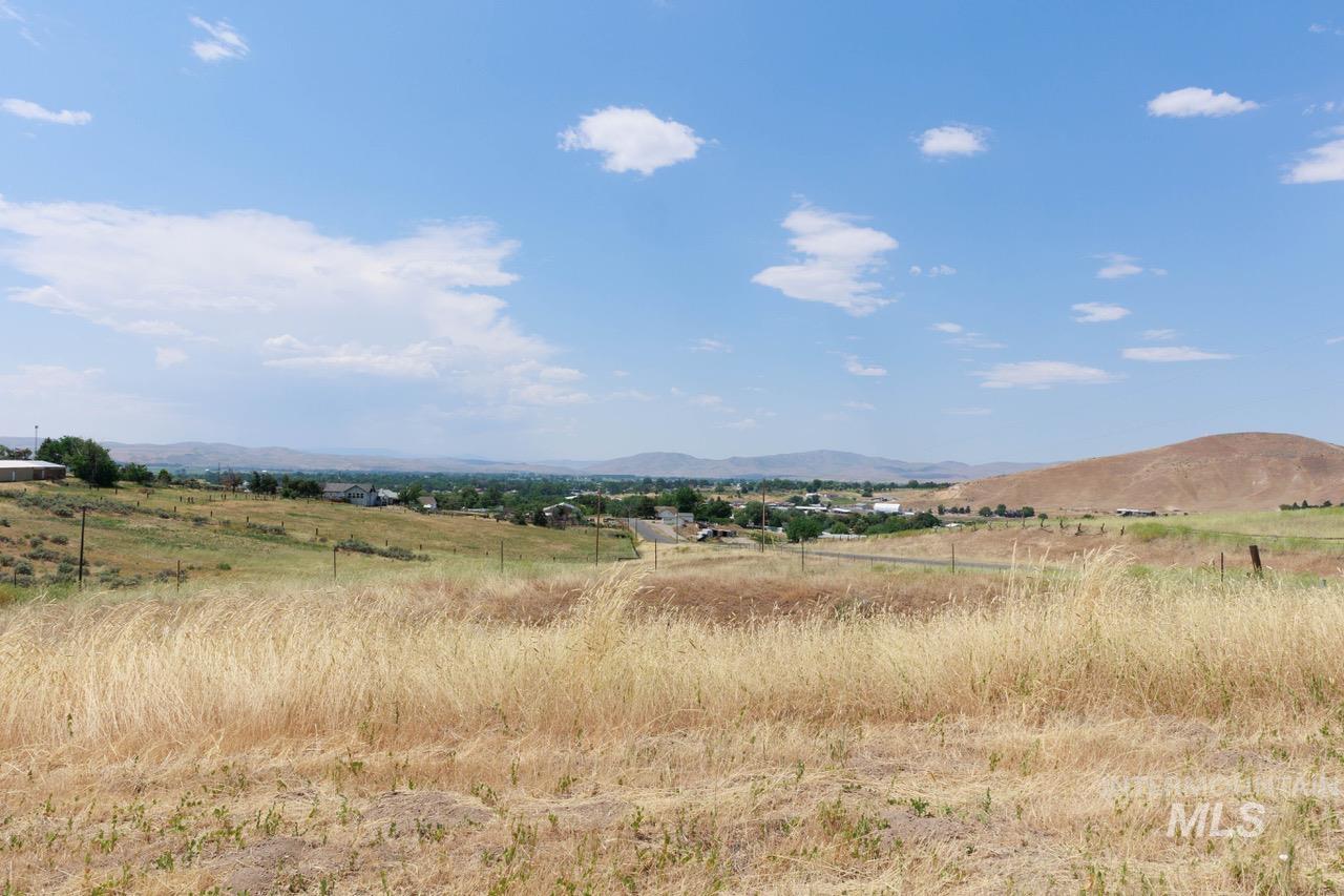 View of mountain background featuring rural landscape