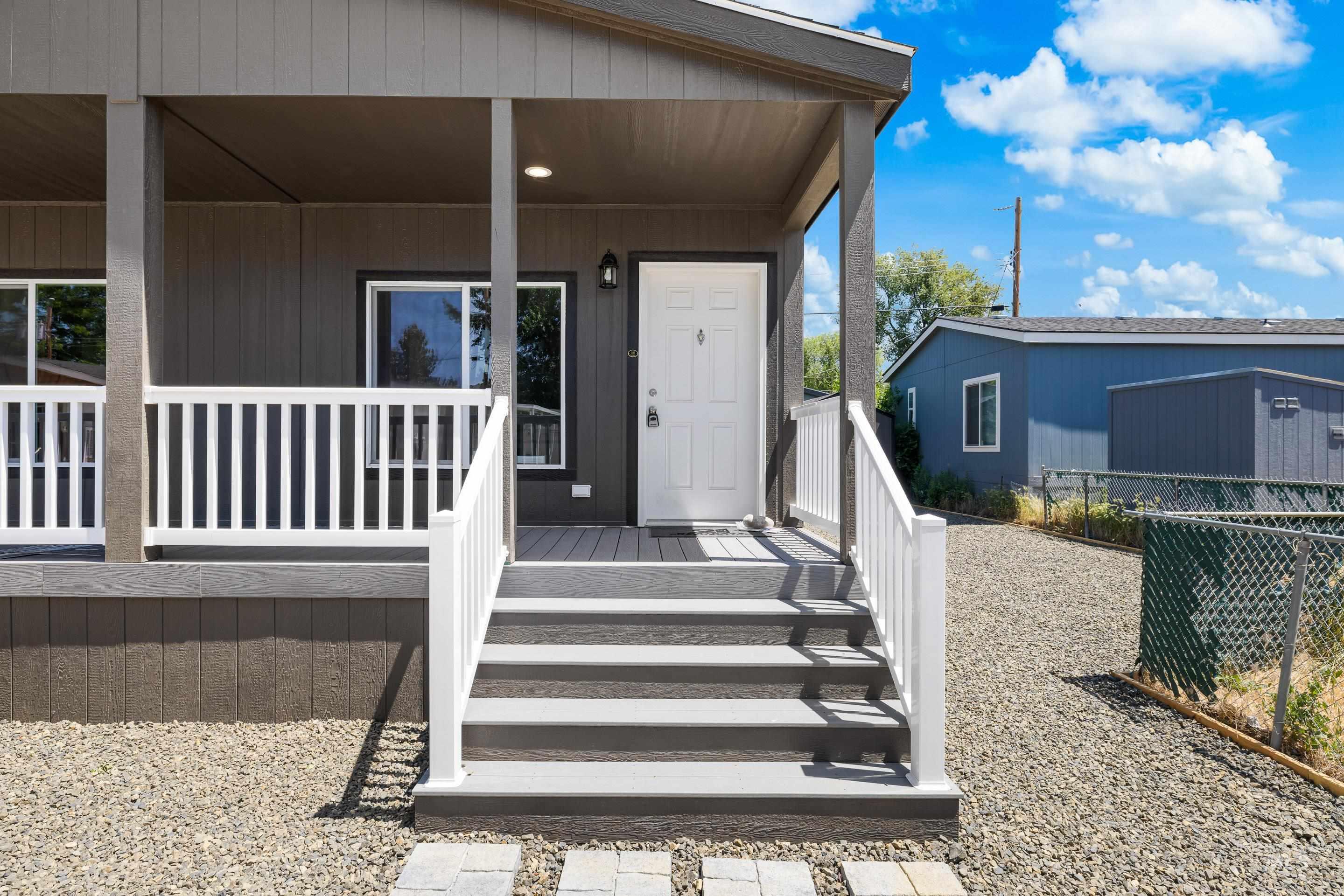 Entrance to property with covered porch