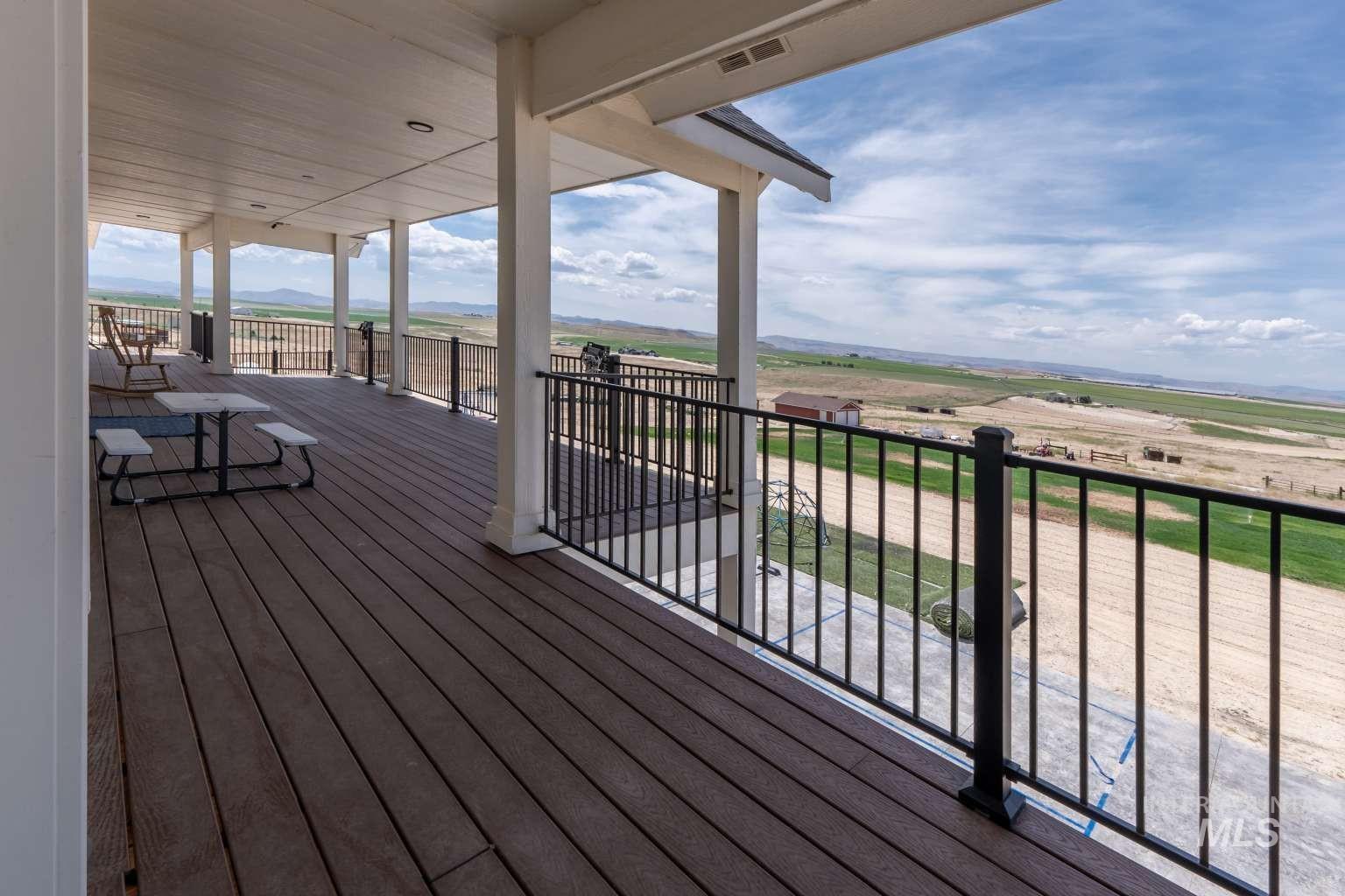 Deck featuring a view of rural / pastoral area