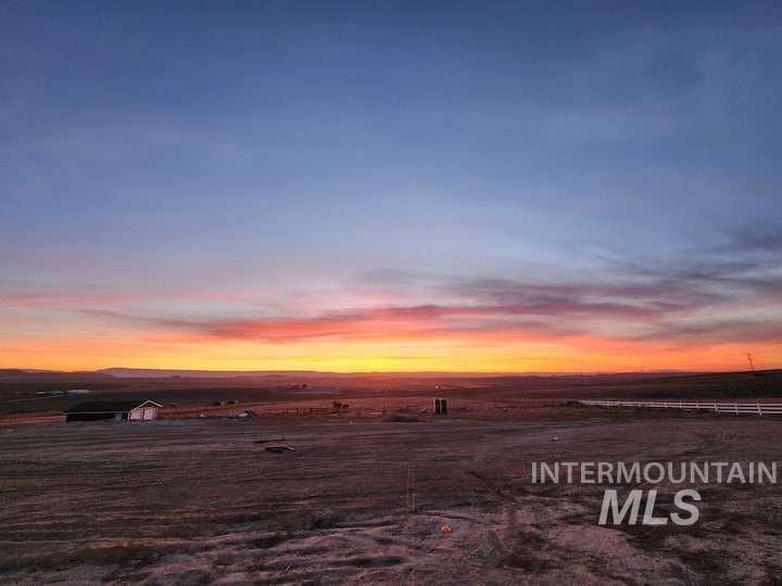 View of yard at dusk