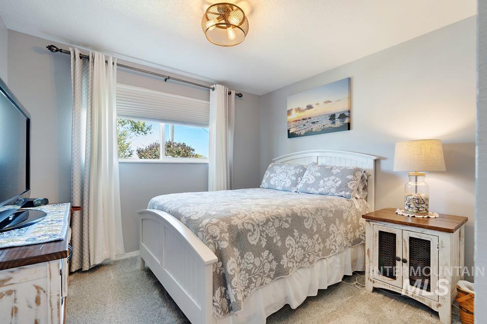 Bedroom featuring baseboards